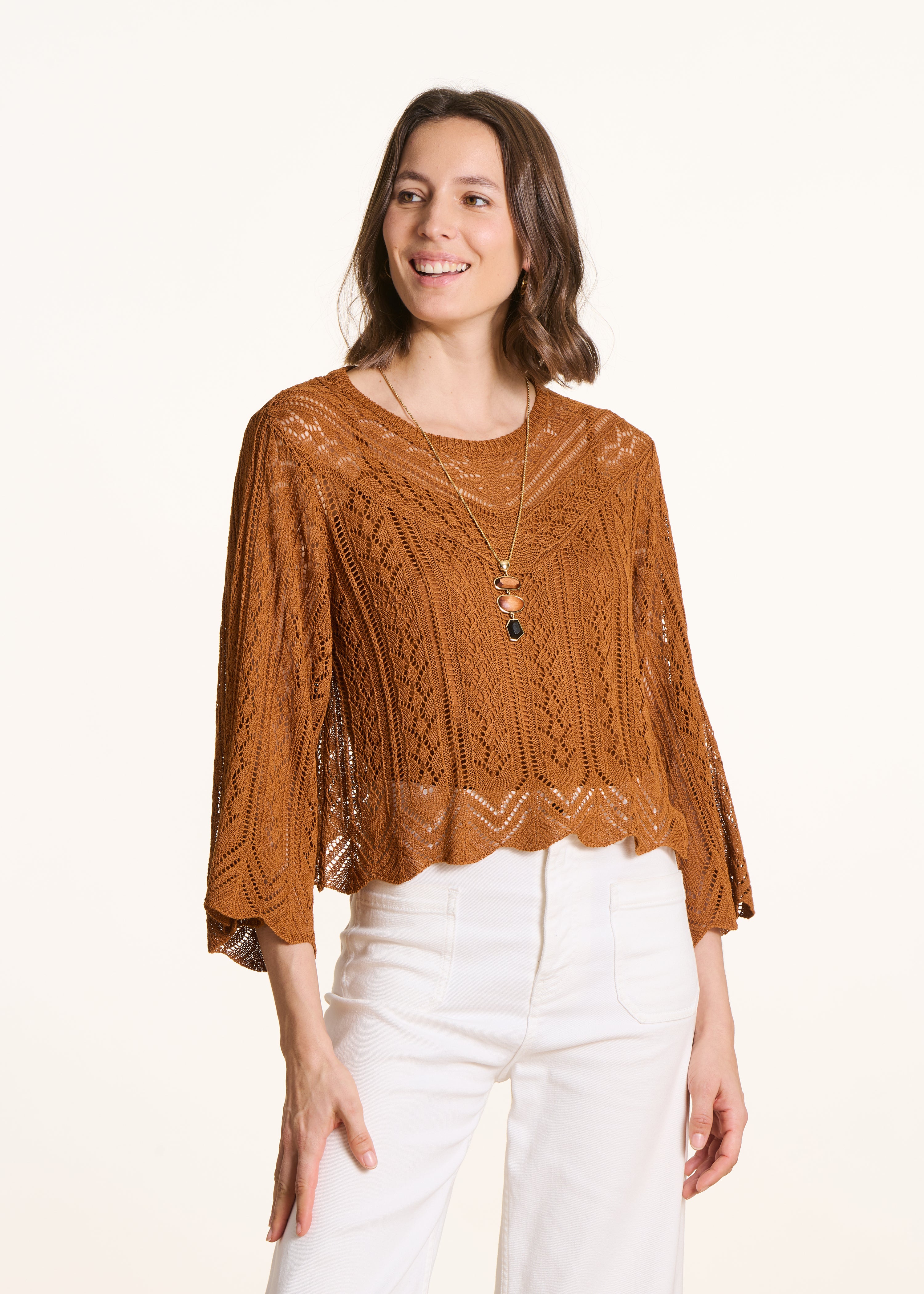 Short brown sweater in fine openwork knit