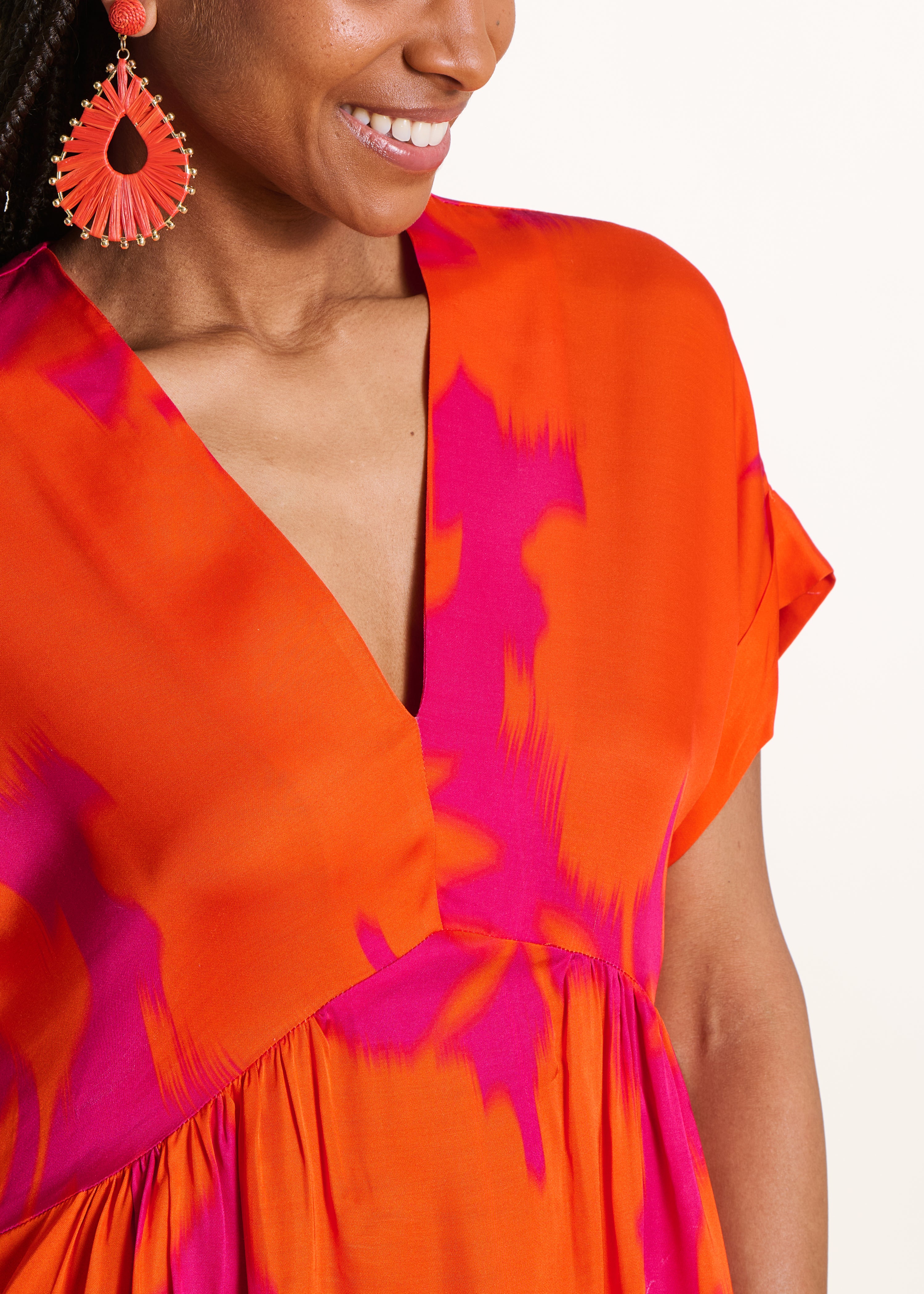 Long floral satin dress in pink and orange