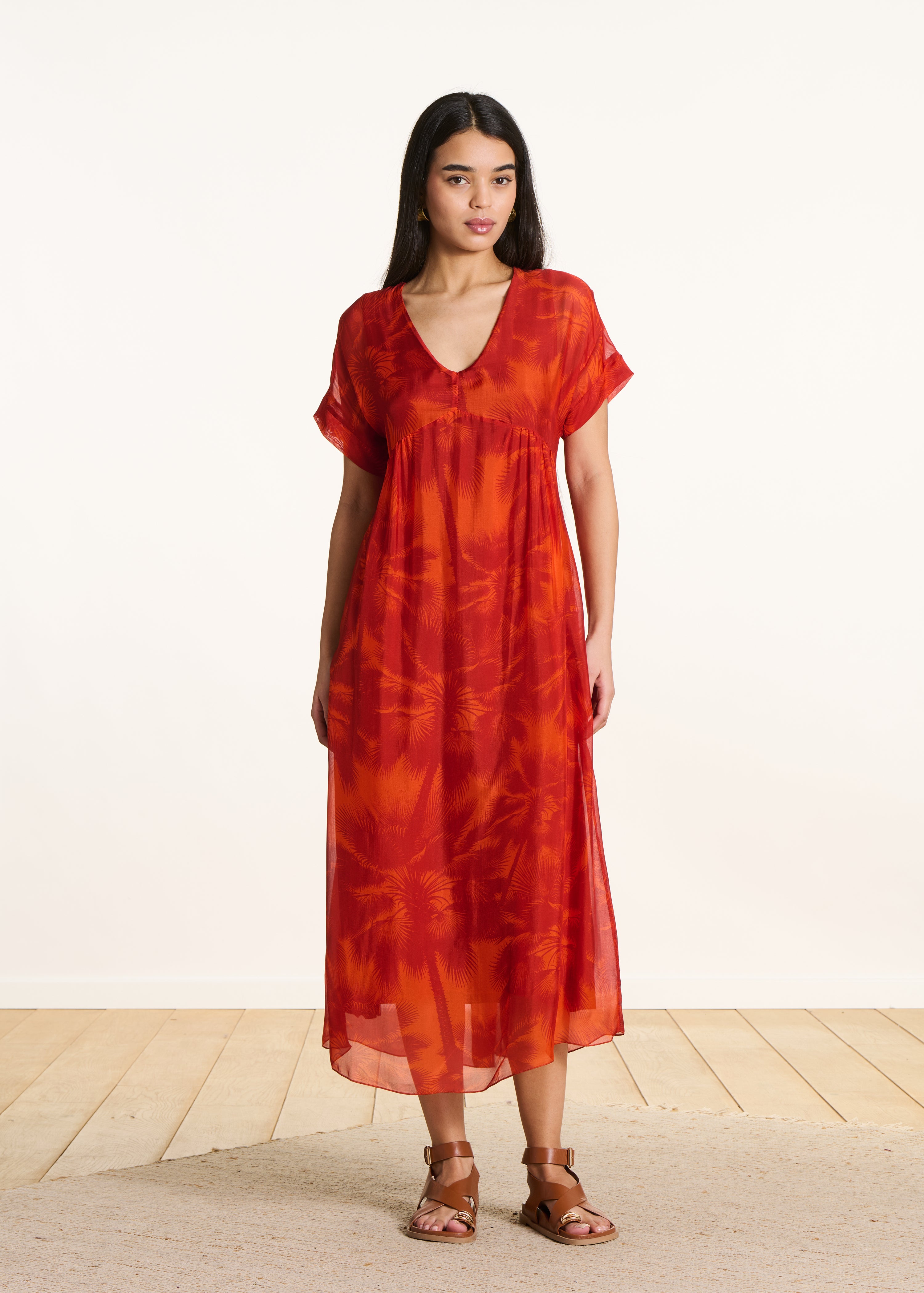 Long orange dress in floral print voile
