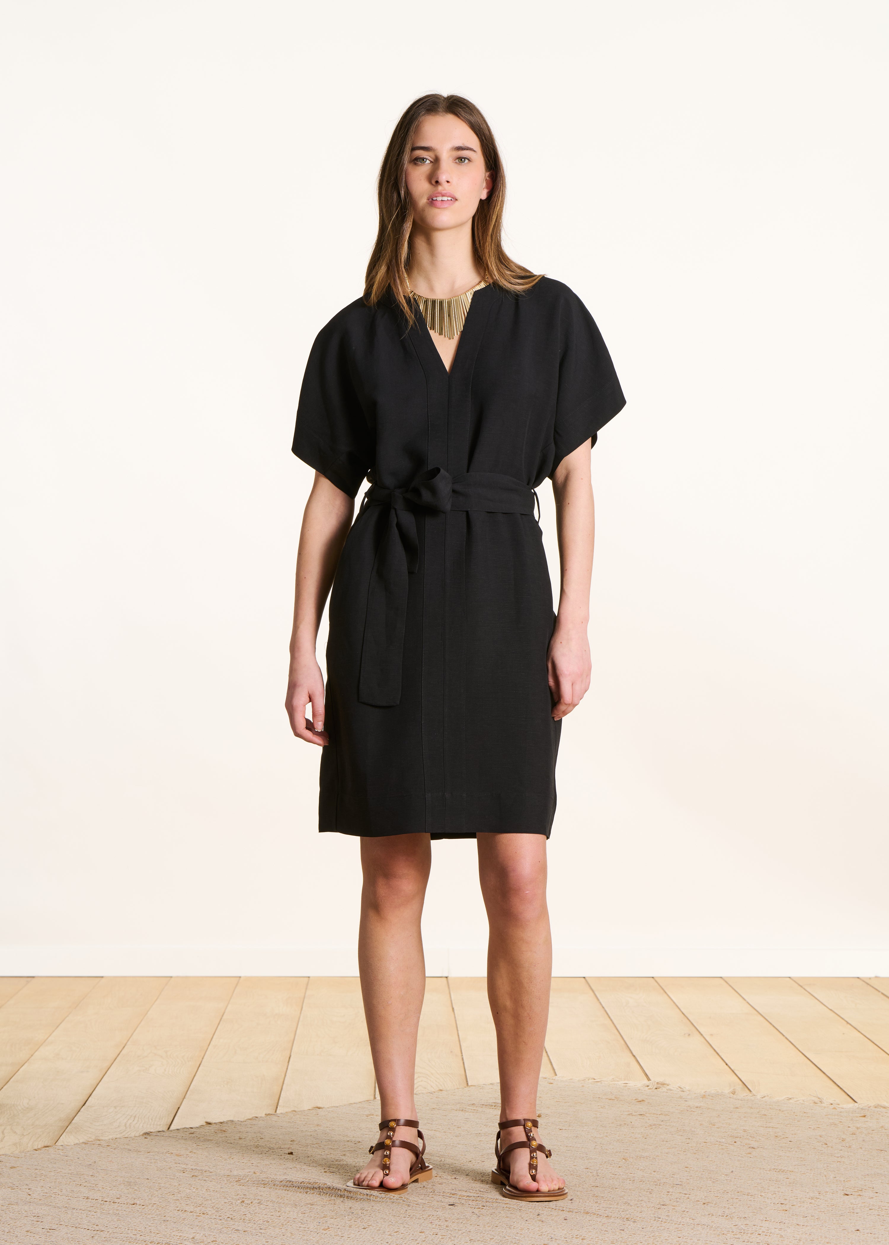 Loose short black dress with short sleeves