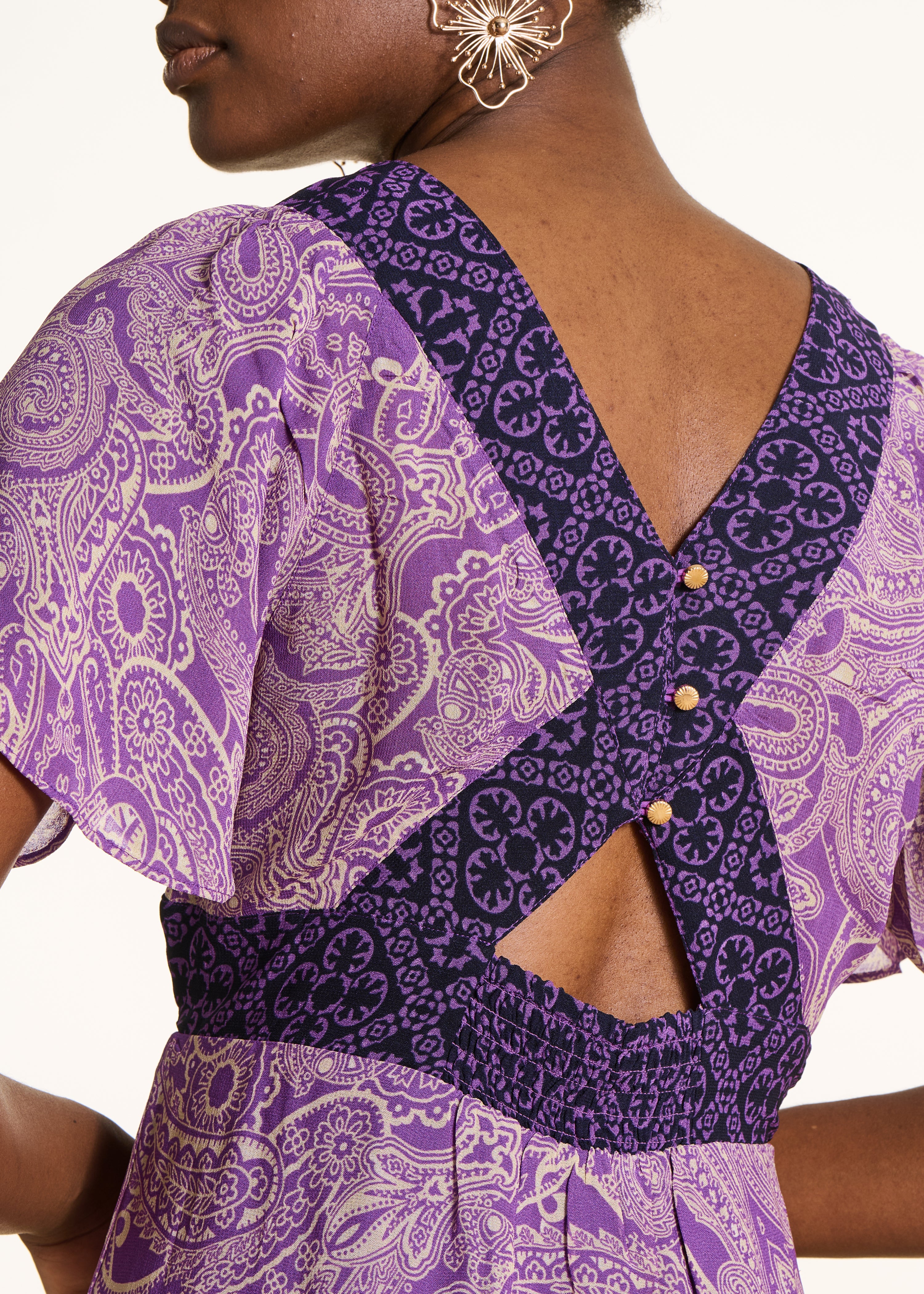 Abito lungo in voile viola con stampa