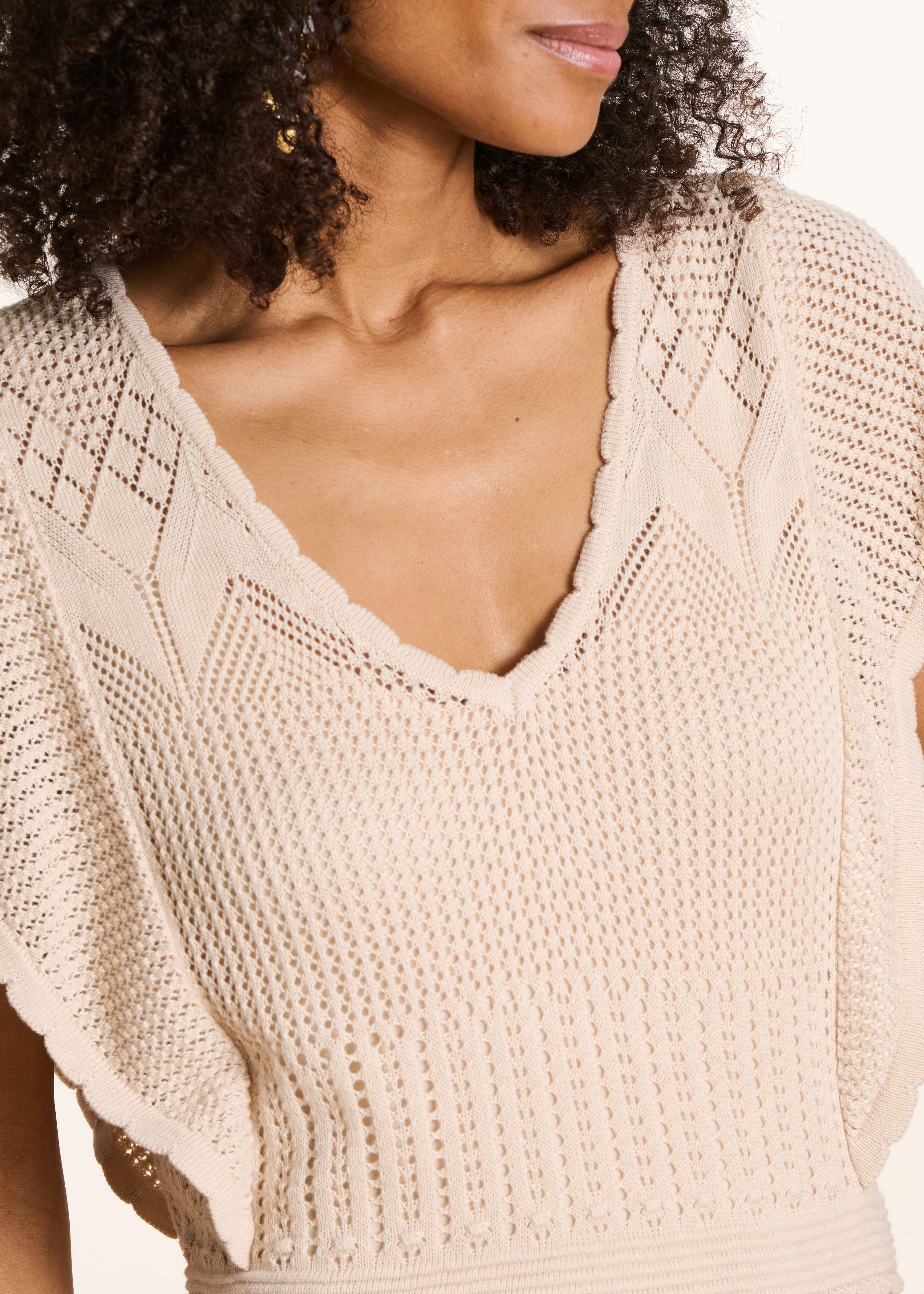 Beige lange jurk van pointelle gebreide stof