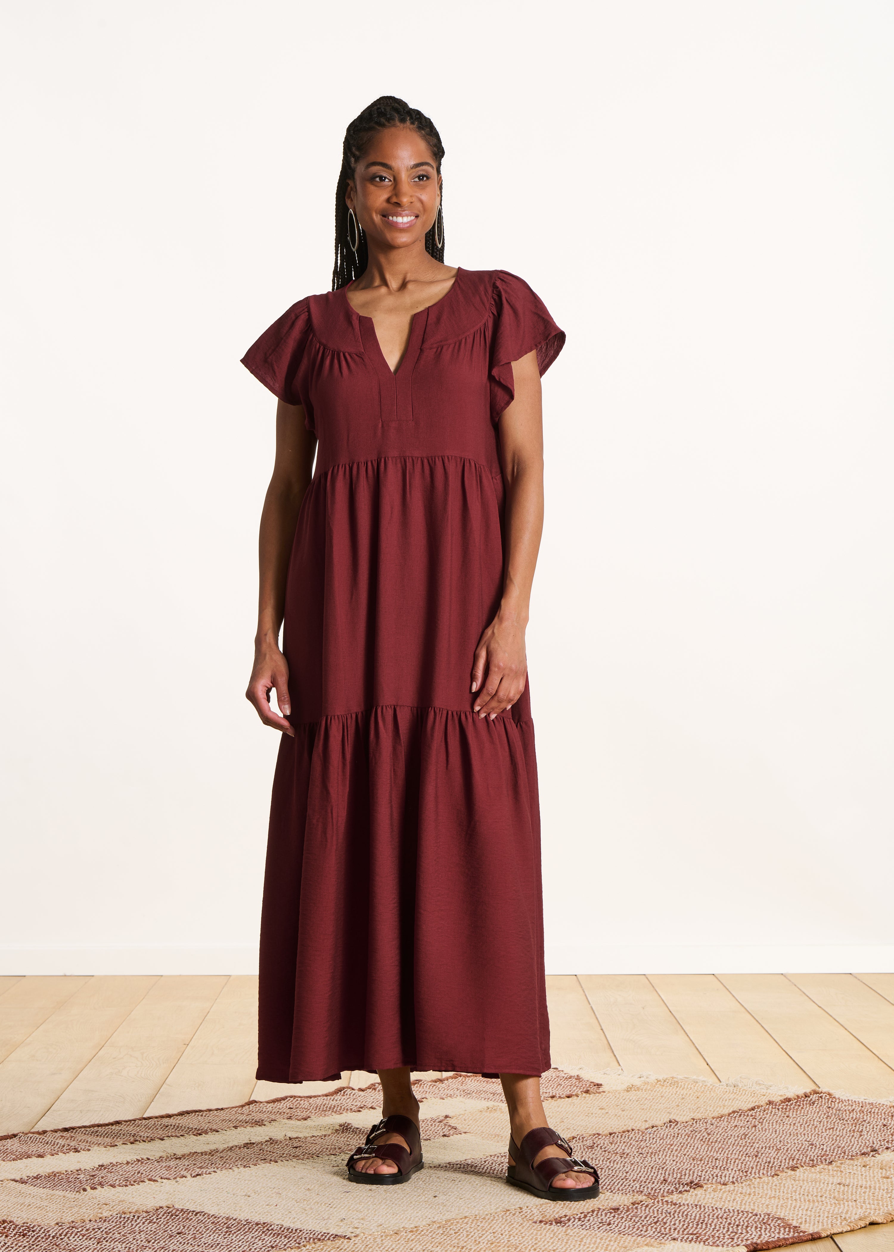 Abito lungo terracotta in jacquard con maniche corte