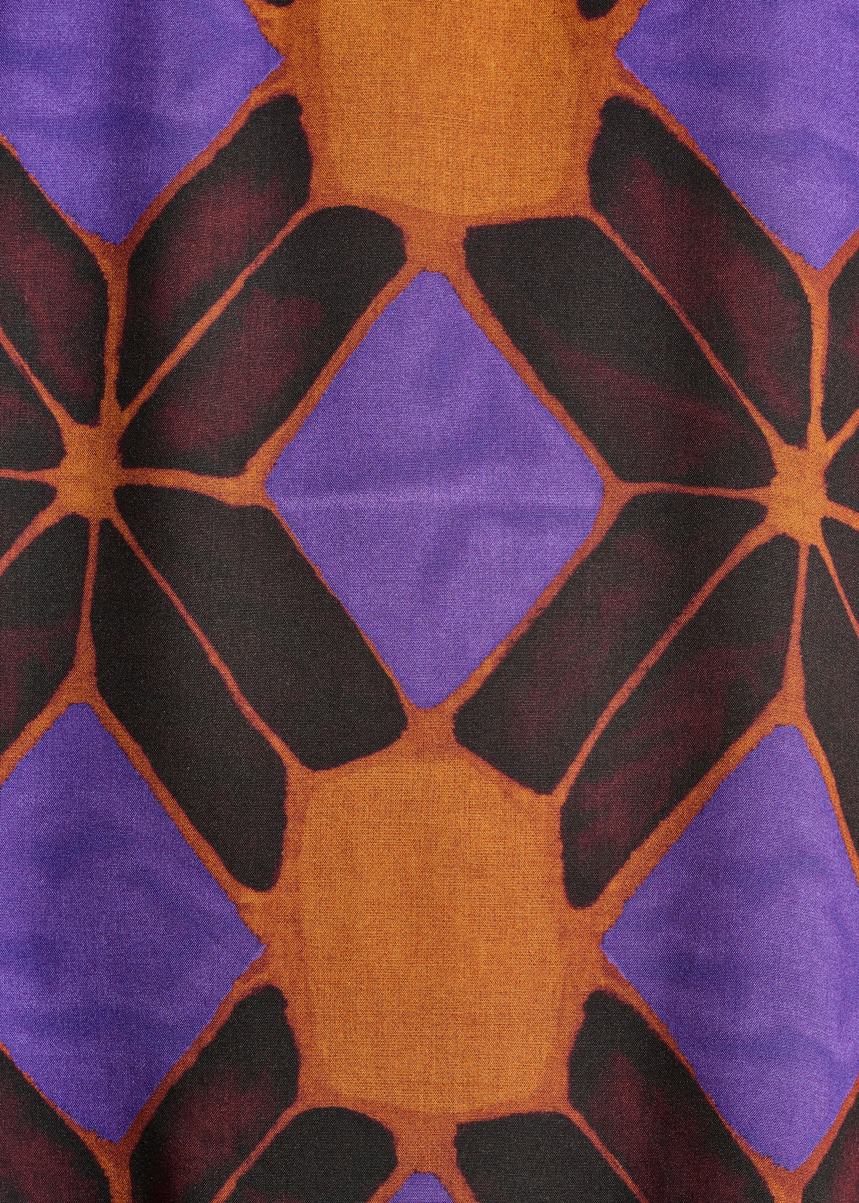 Short orange and purple dress with print and short sleeves