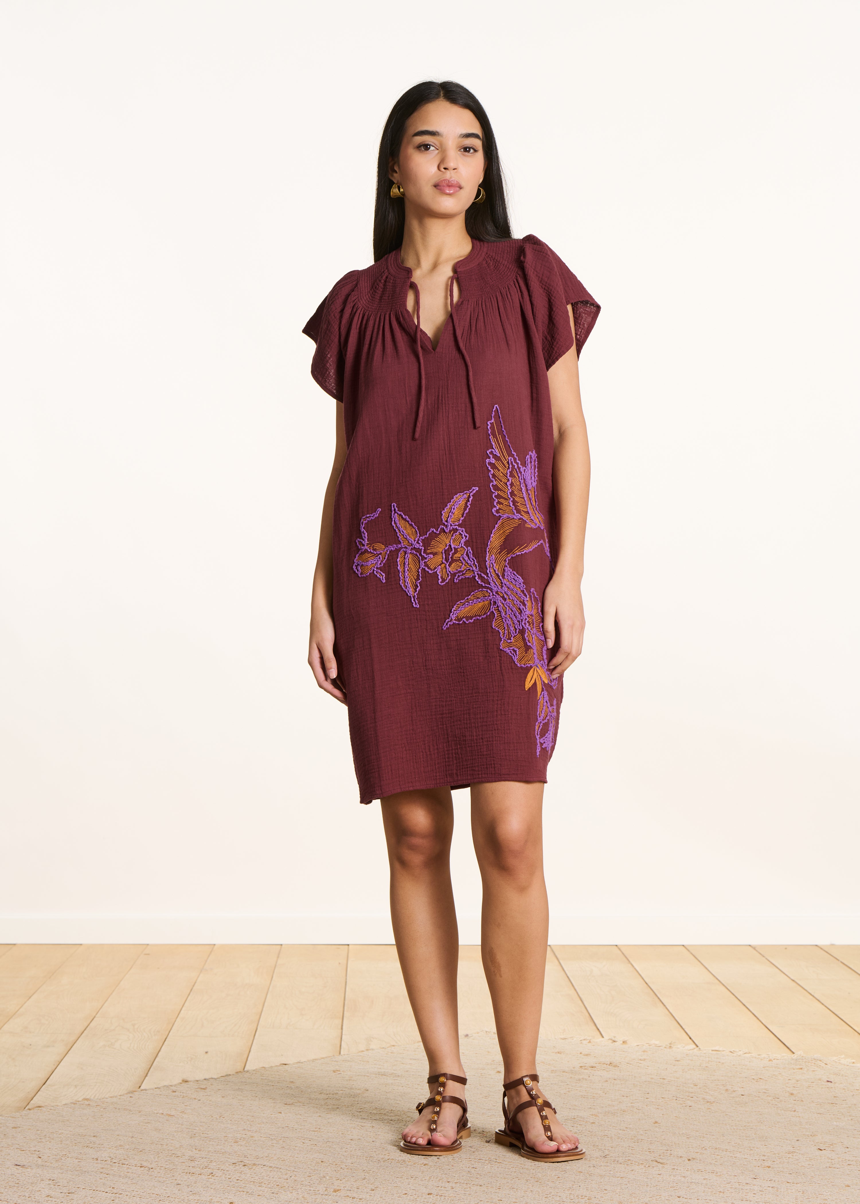 Short dress in embroidered brown cotton gauze with V-neck