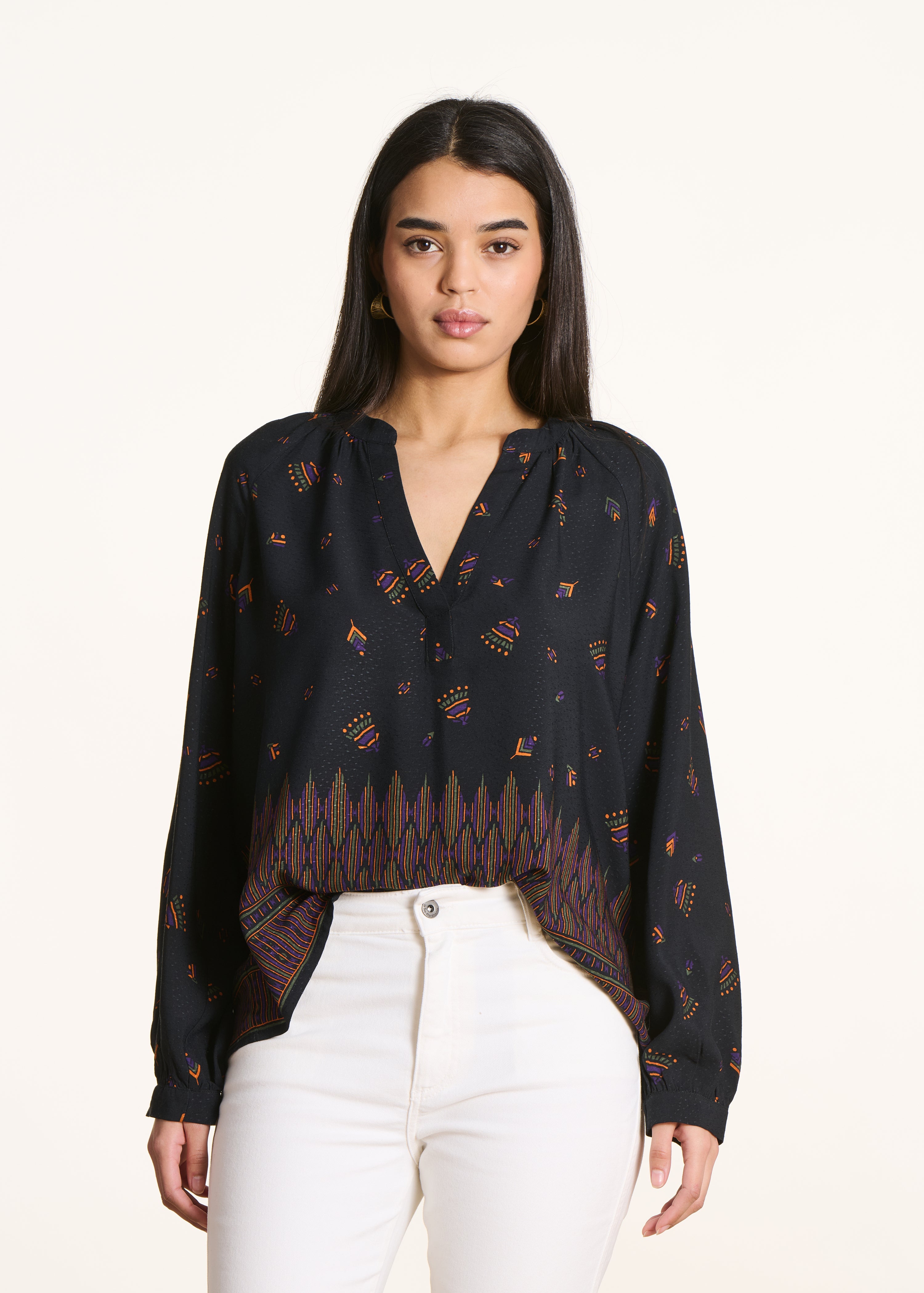 Loose black top with printed long sleeves