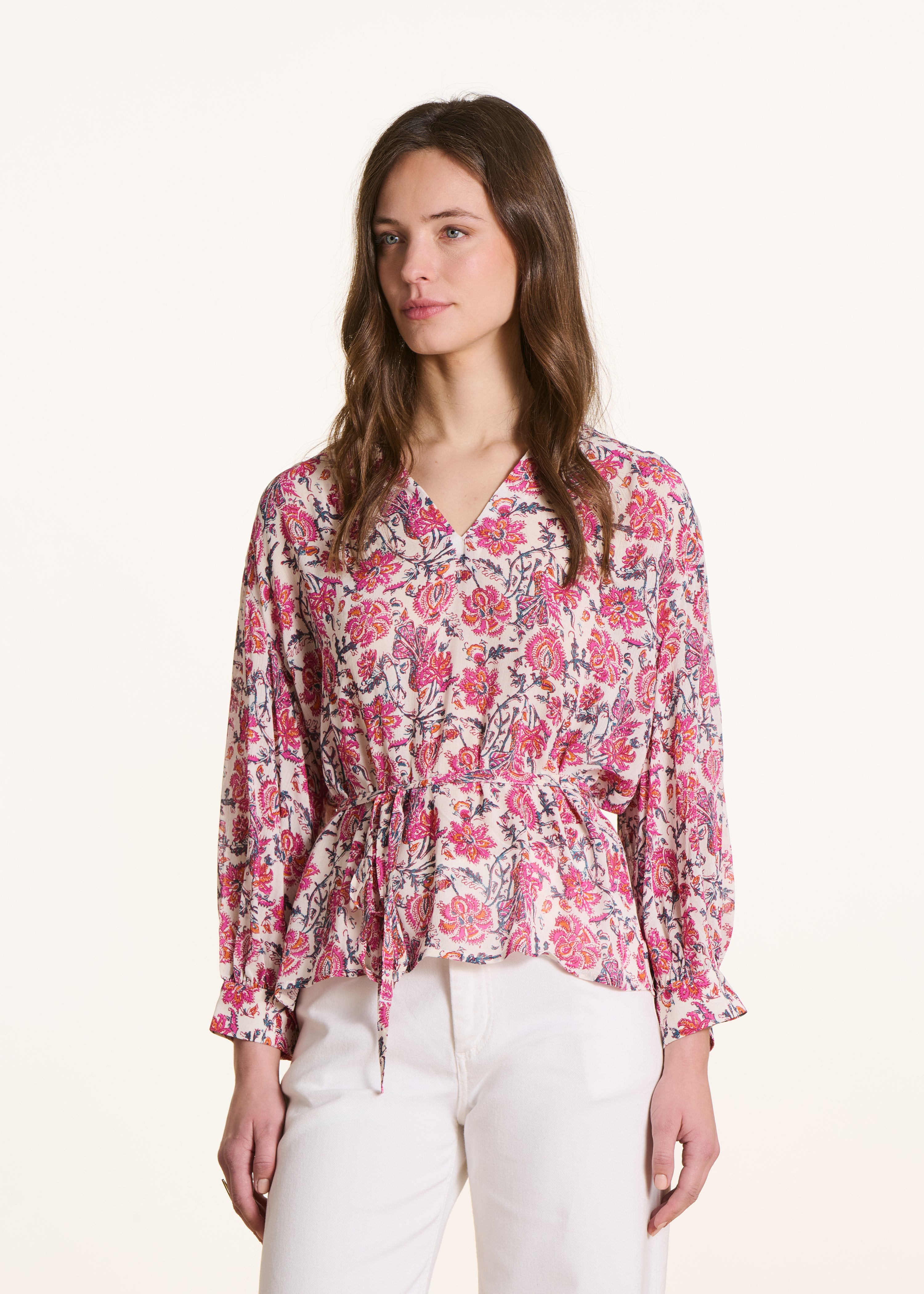 Loose pink floral print top with long sleeves