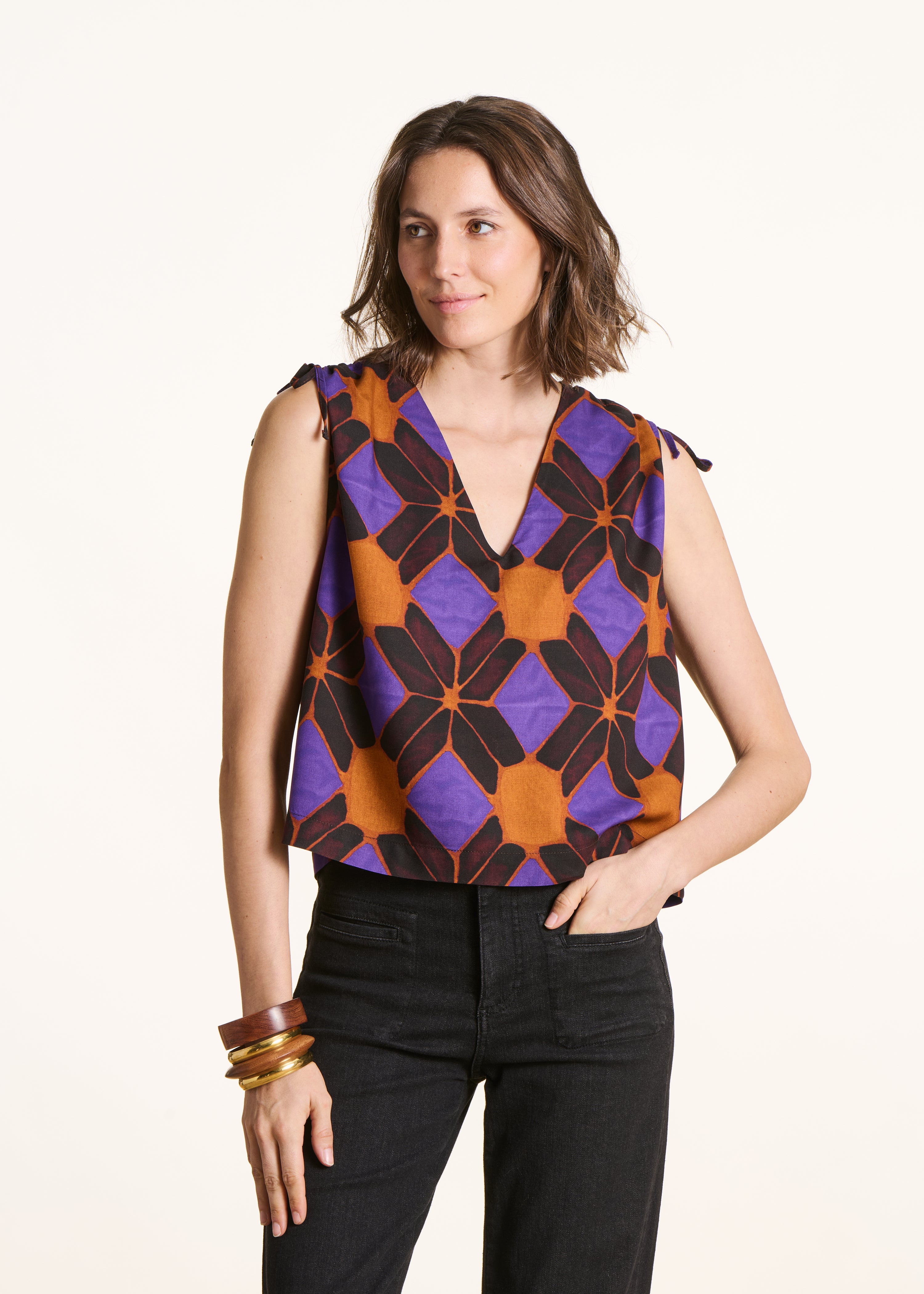 Sleeveless top with orange and purple print