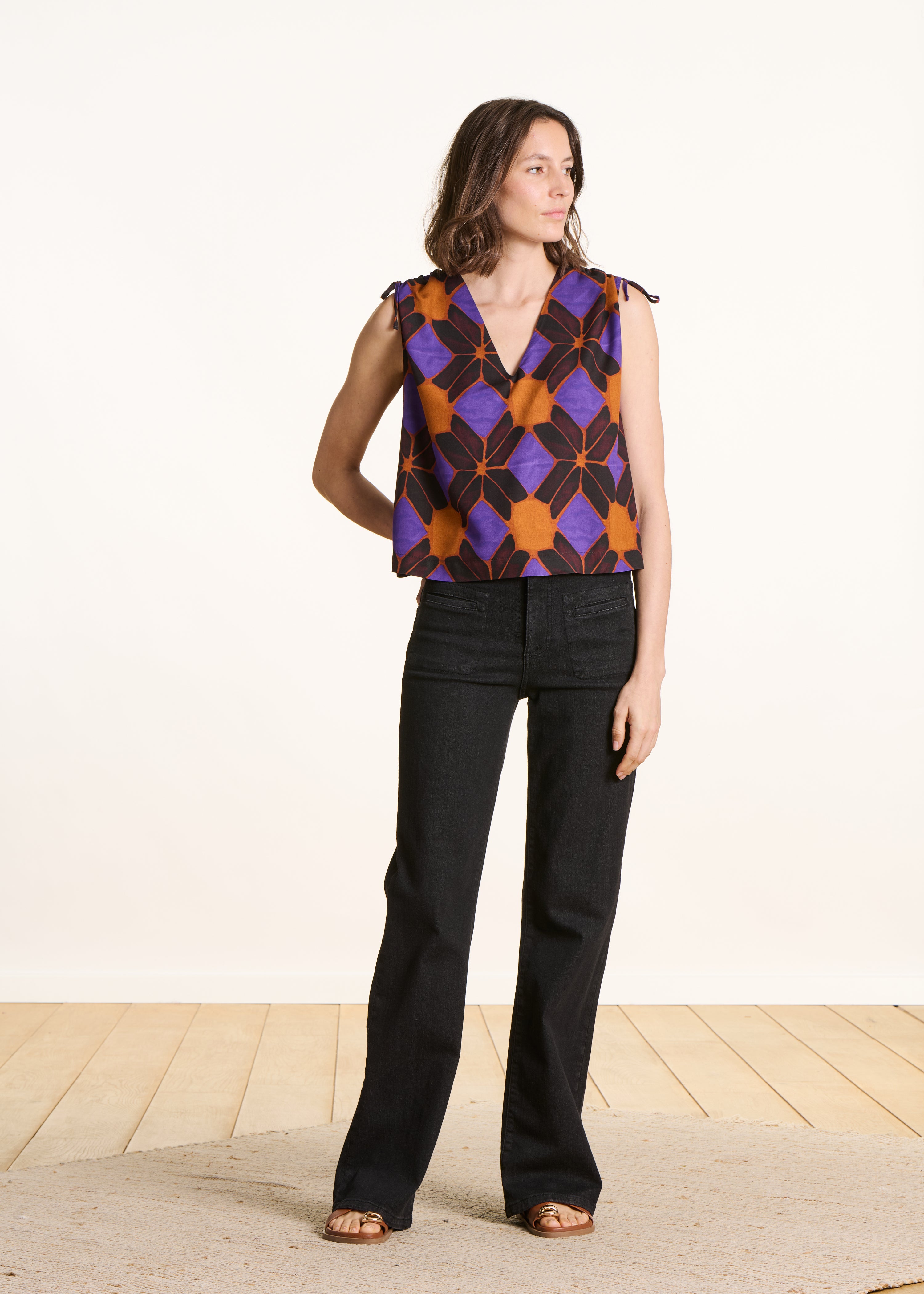 Sleeveless top with orange and purple print