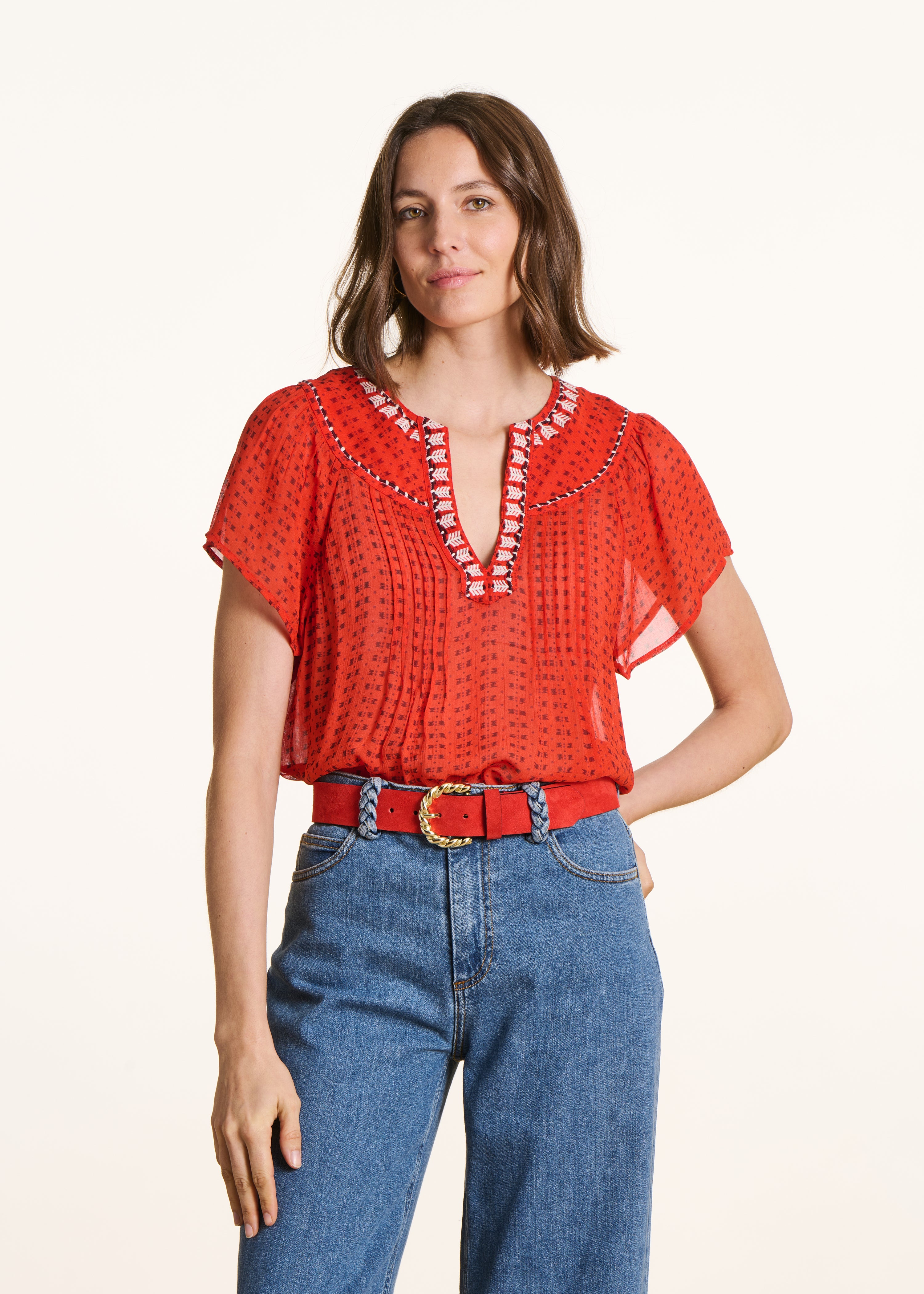 Loose orange blouse with print