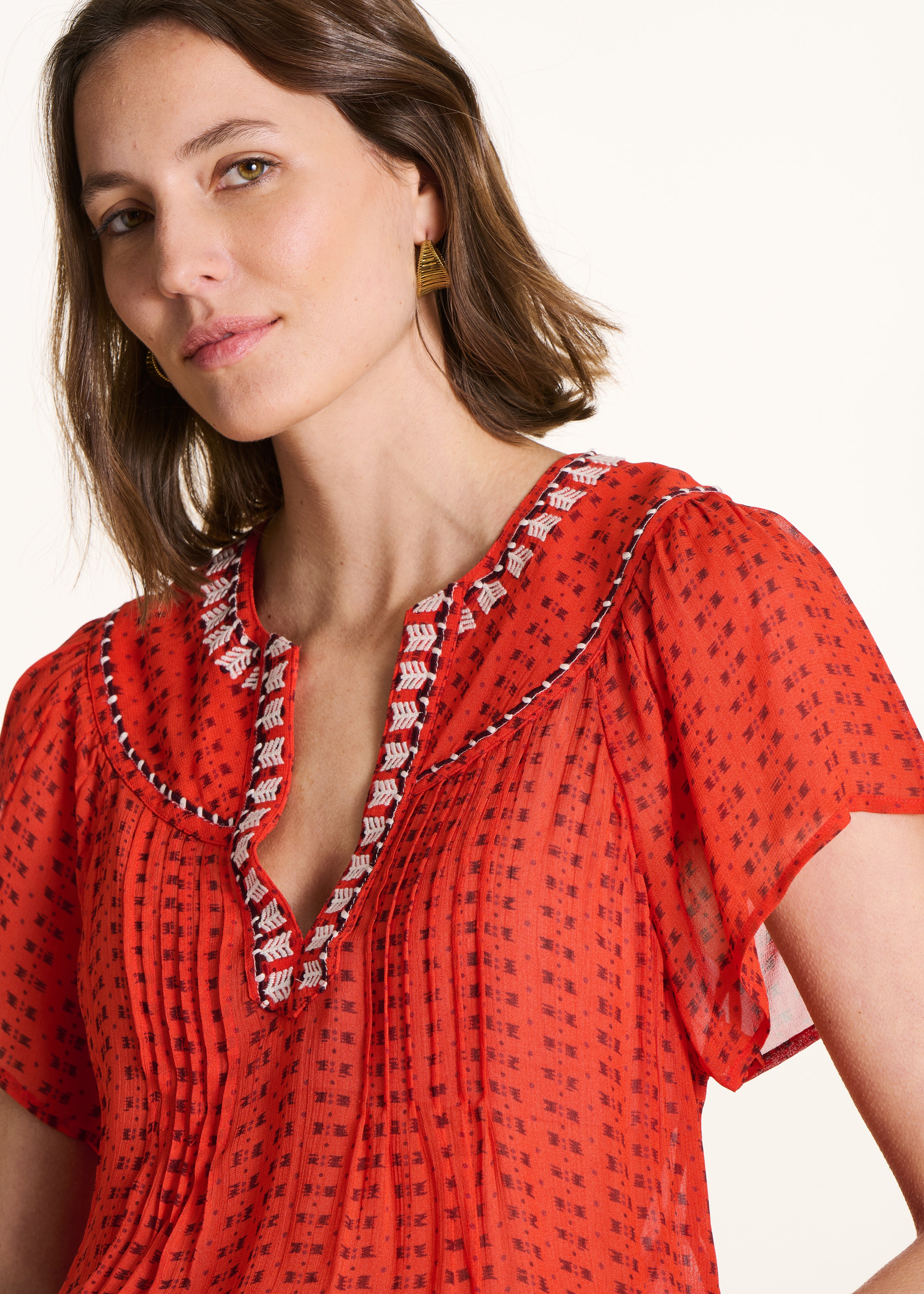 Weite orange Bluse mit Muster