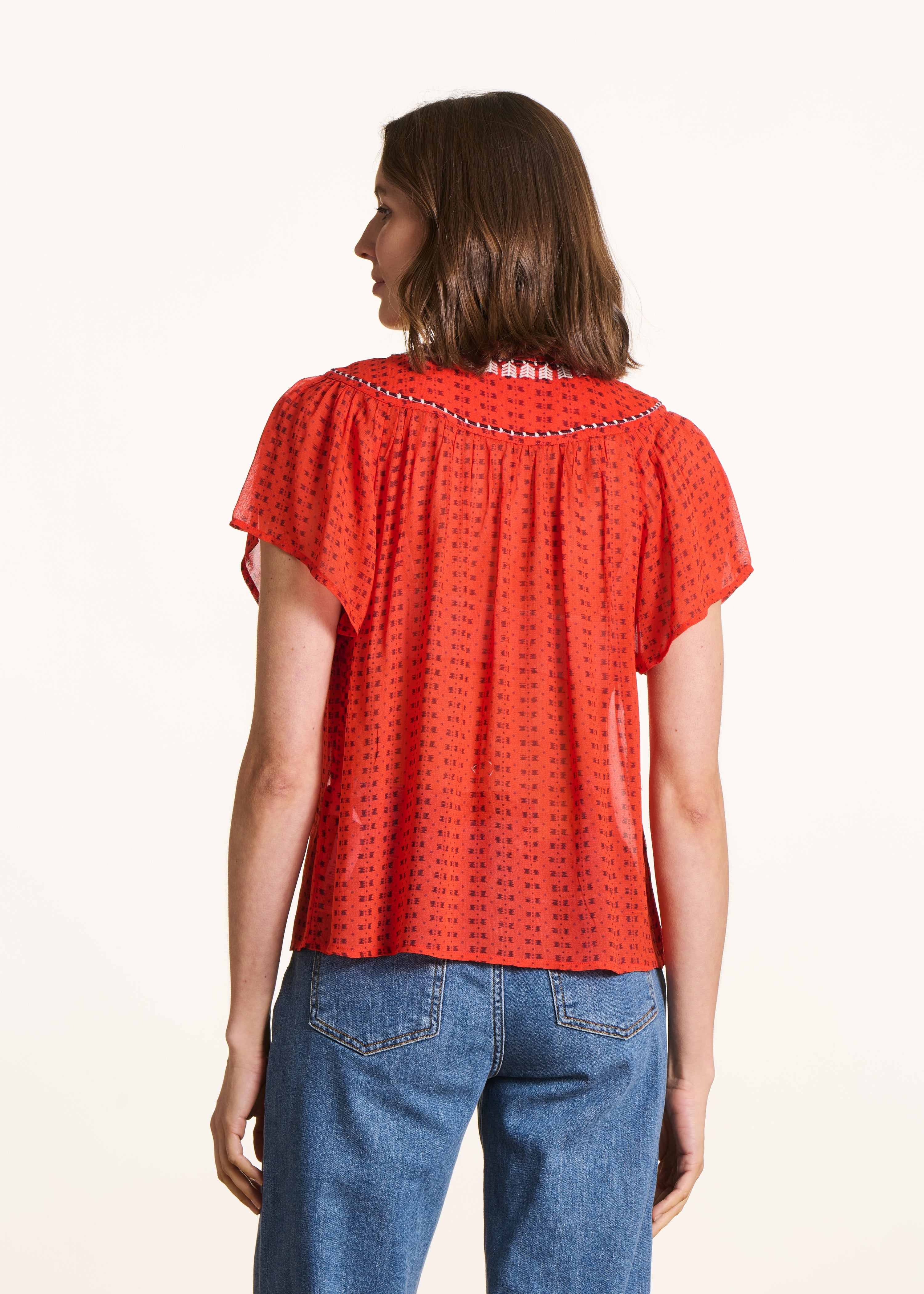 Weite orange Bluse mit Muster