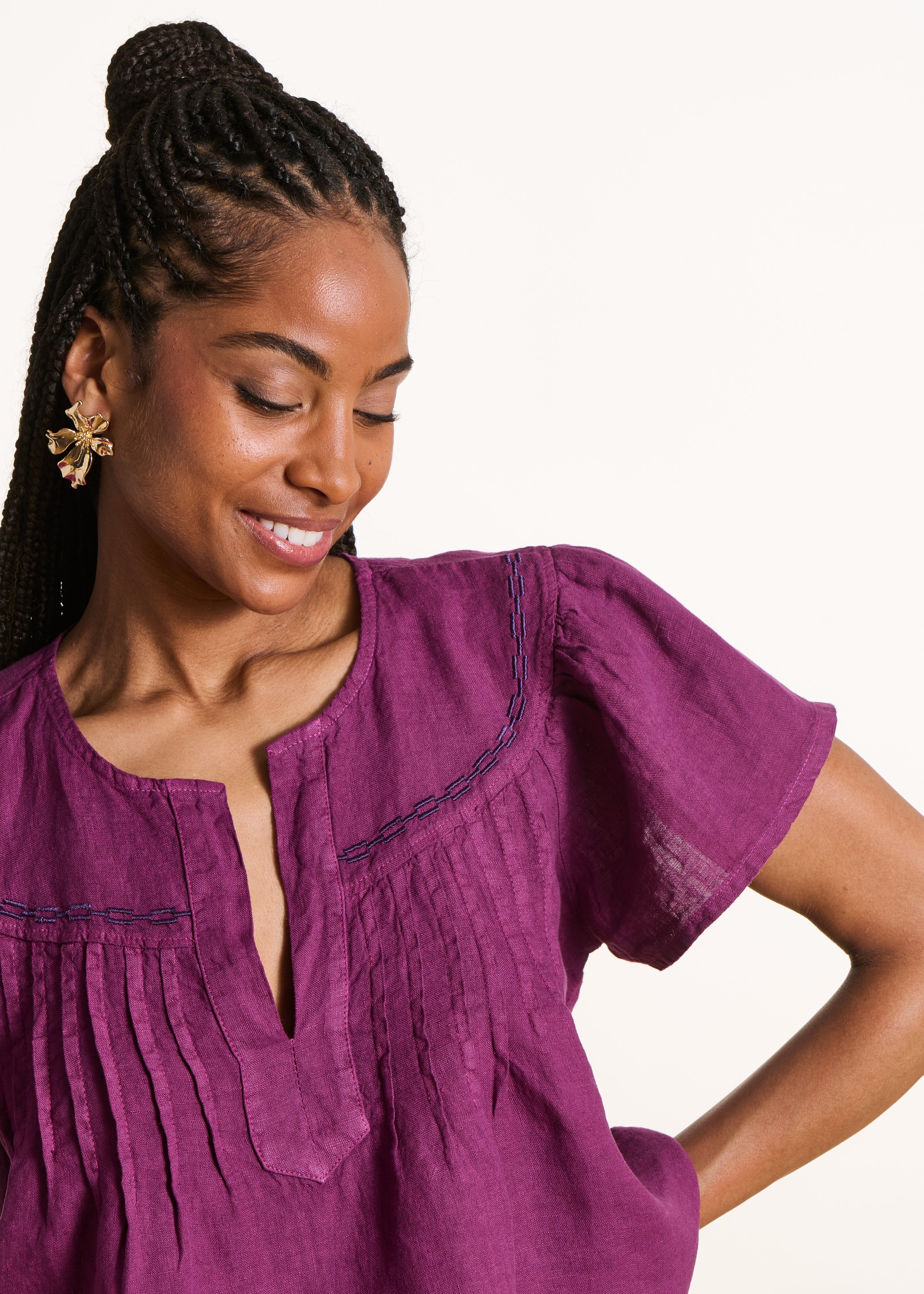 Loose violet linen top with short sleeves