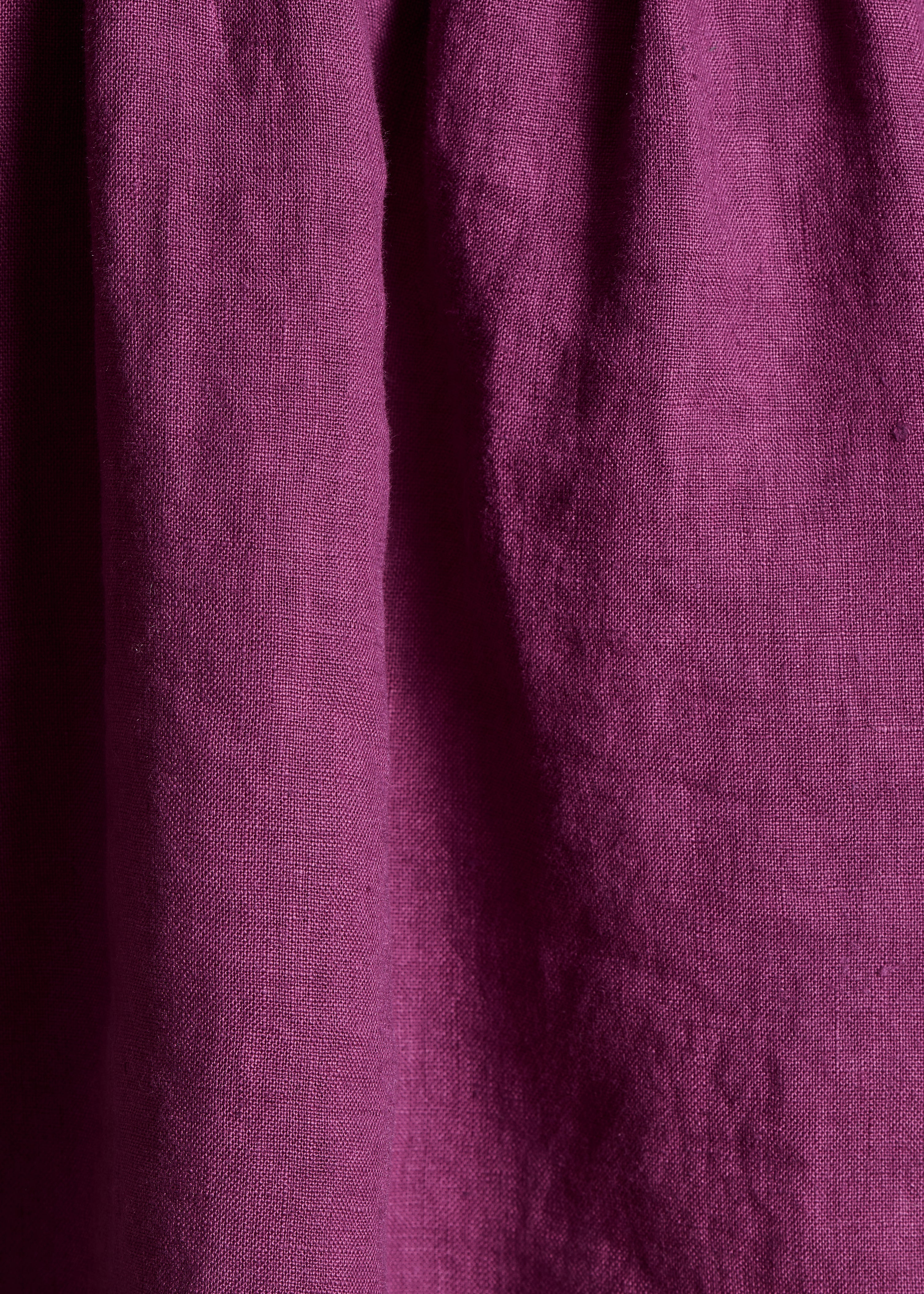 Loose violet linen top with short sleeves