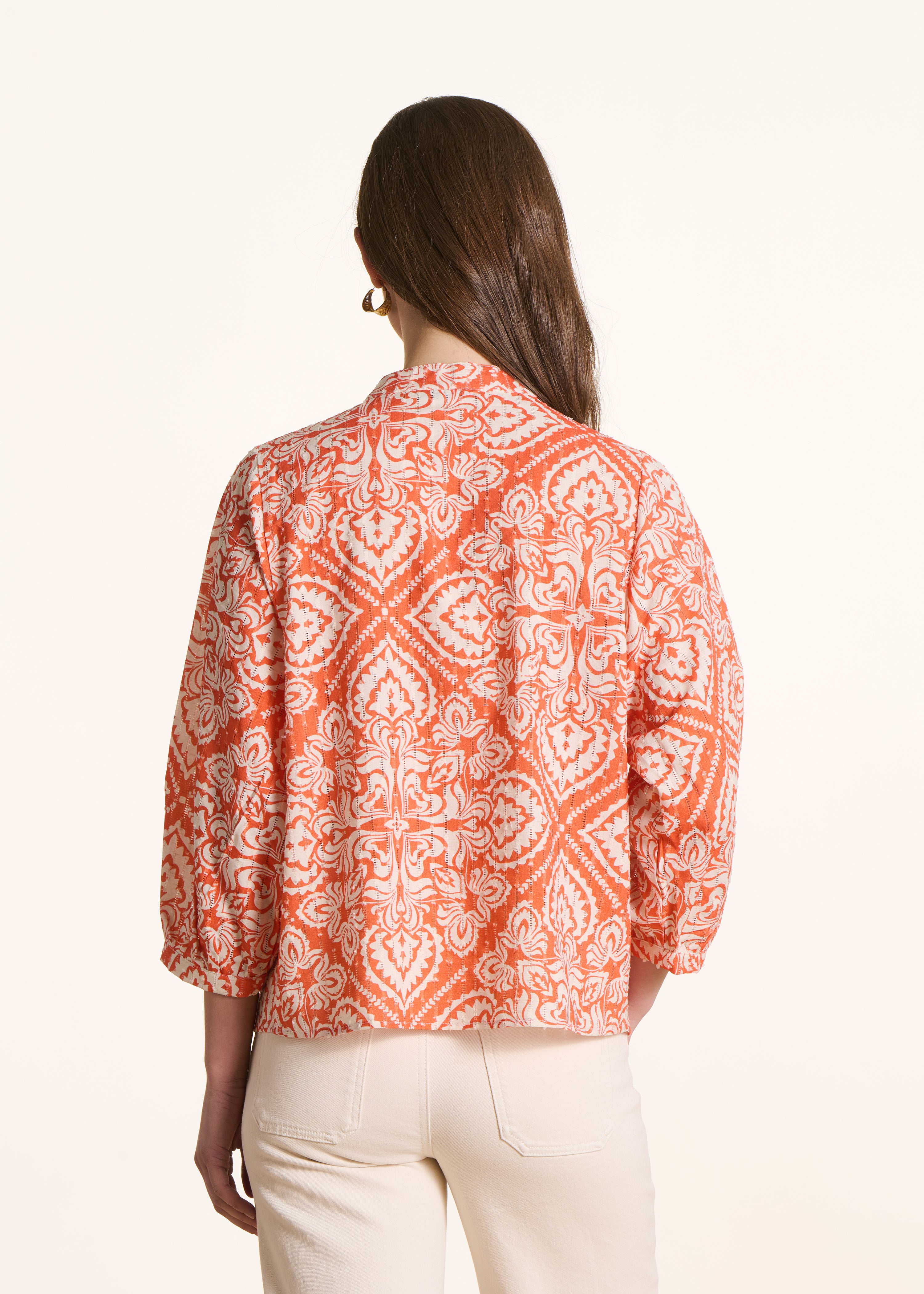 Top in Orange mit floraler Lochstickerei und 3/4-Ärmeln