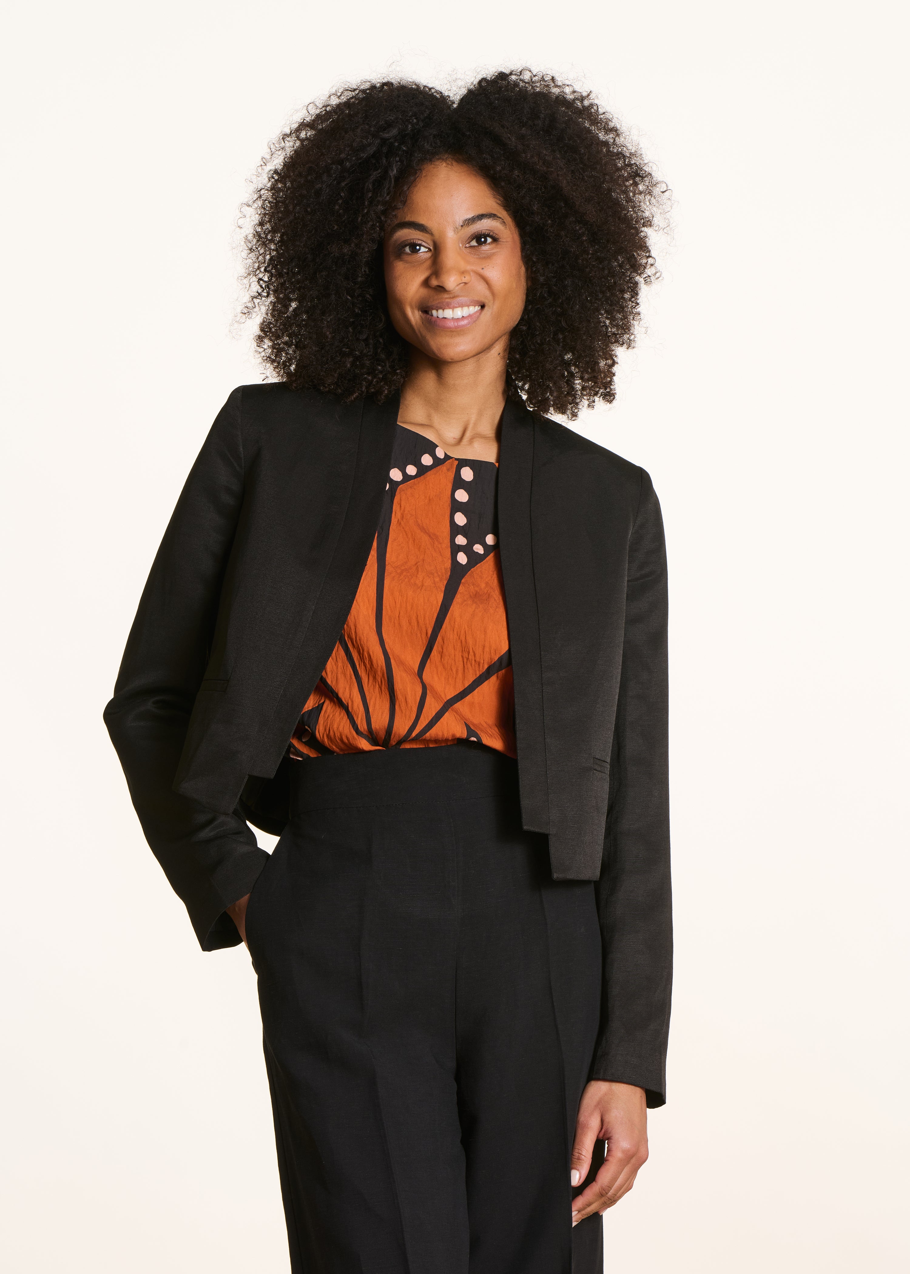 Open short shimmering black jacket