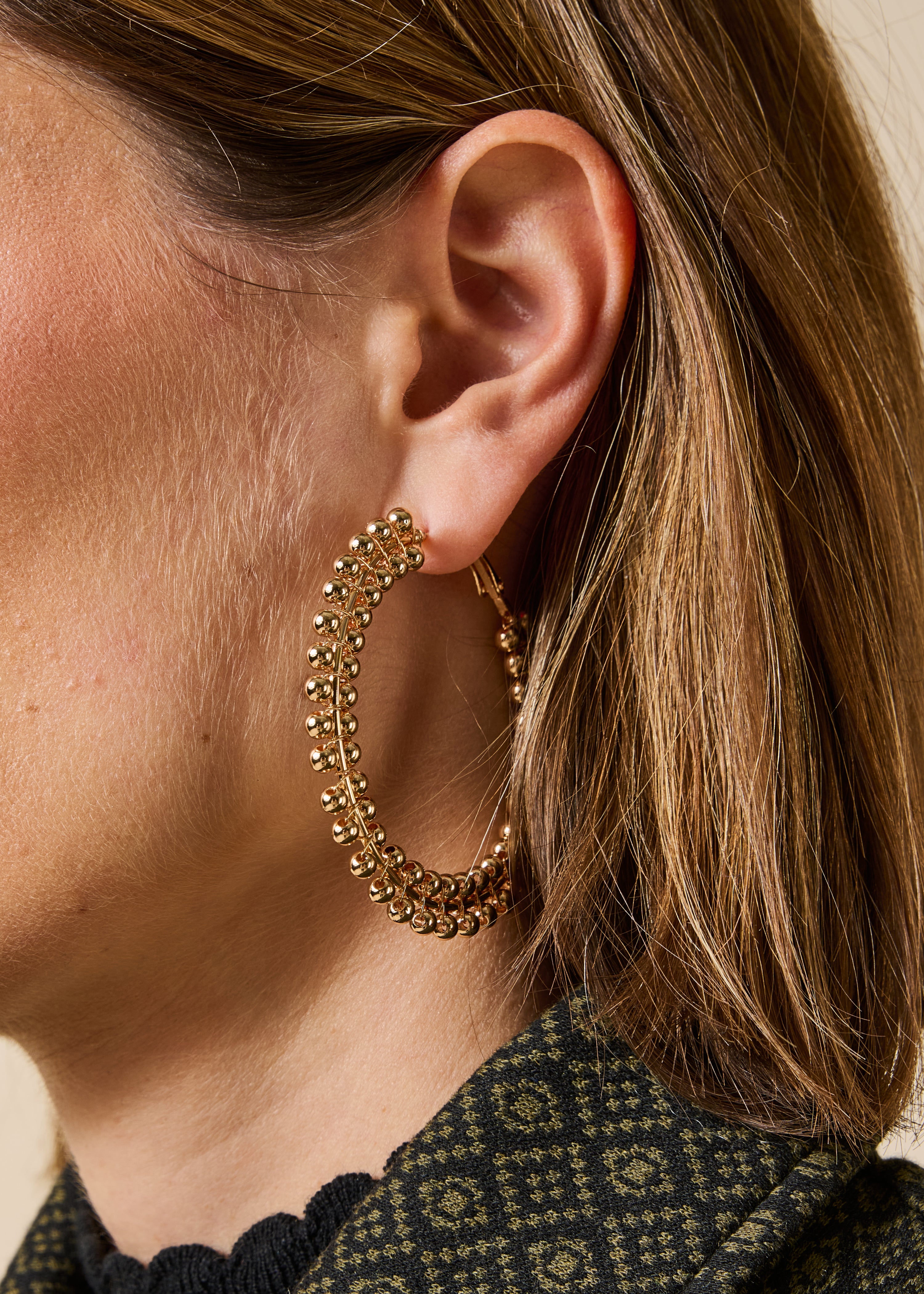 Boucles d'oreilles créoles dorées