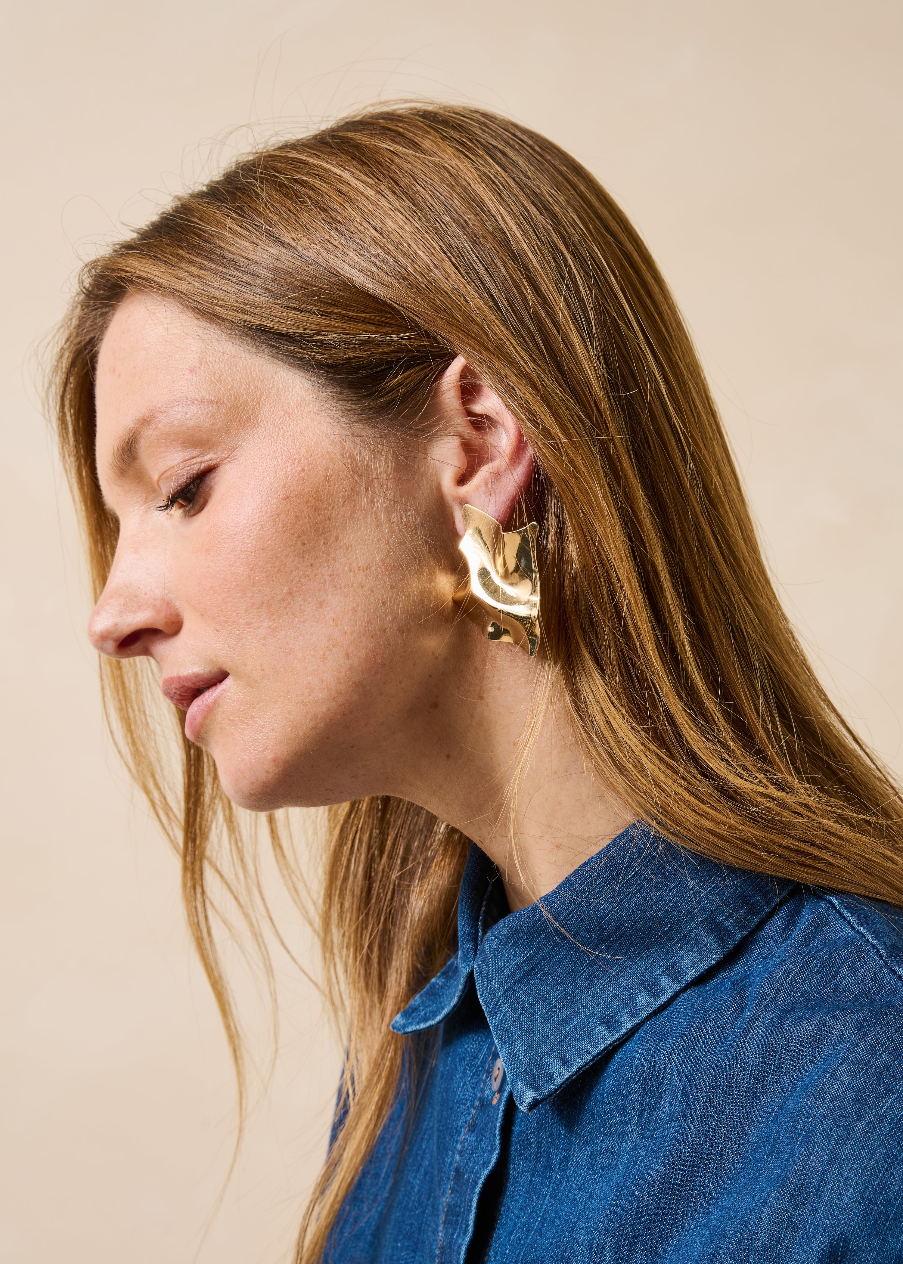 Boucles d'oreilles pendantes dorées