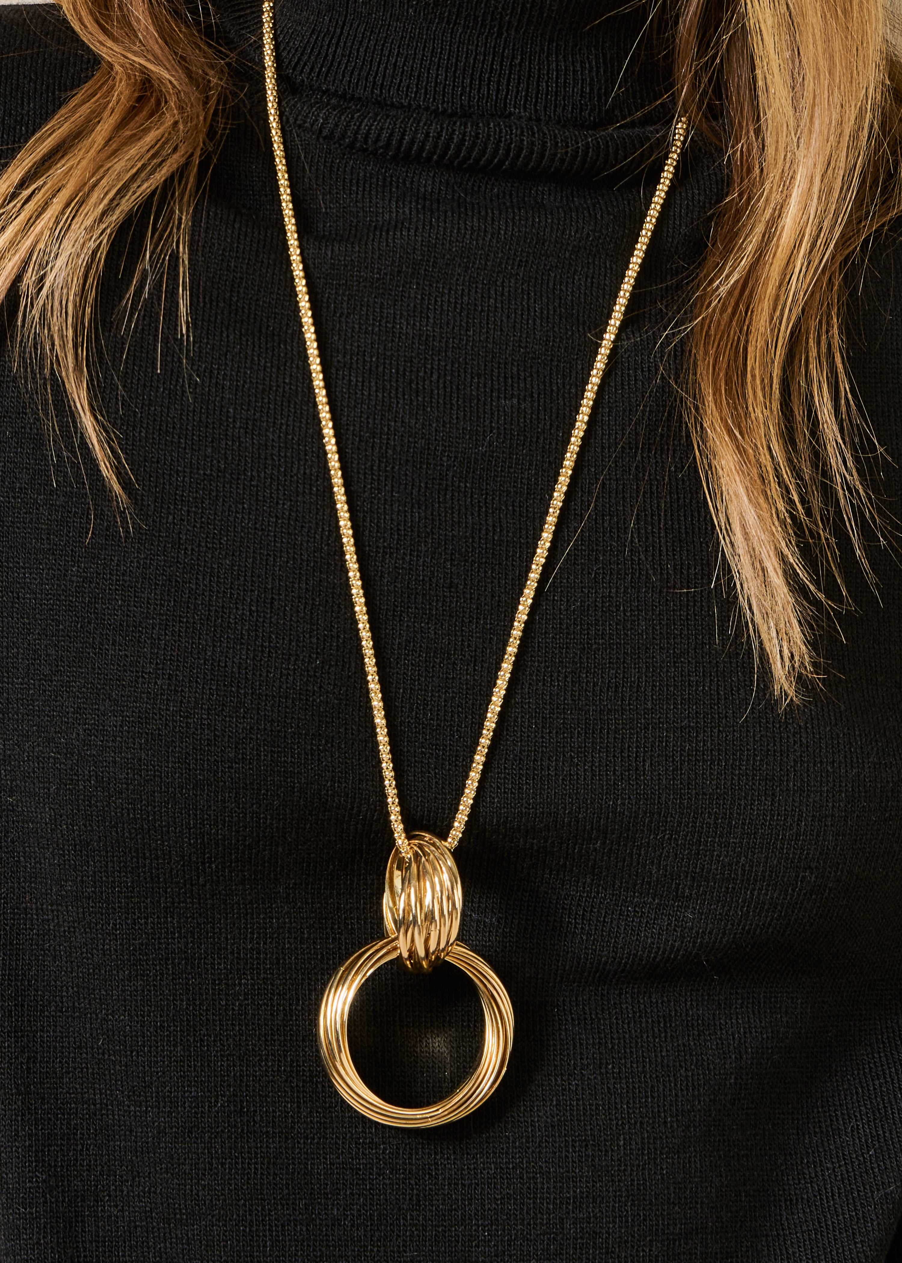 Collier sautoir multianneaux doré