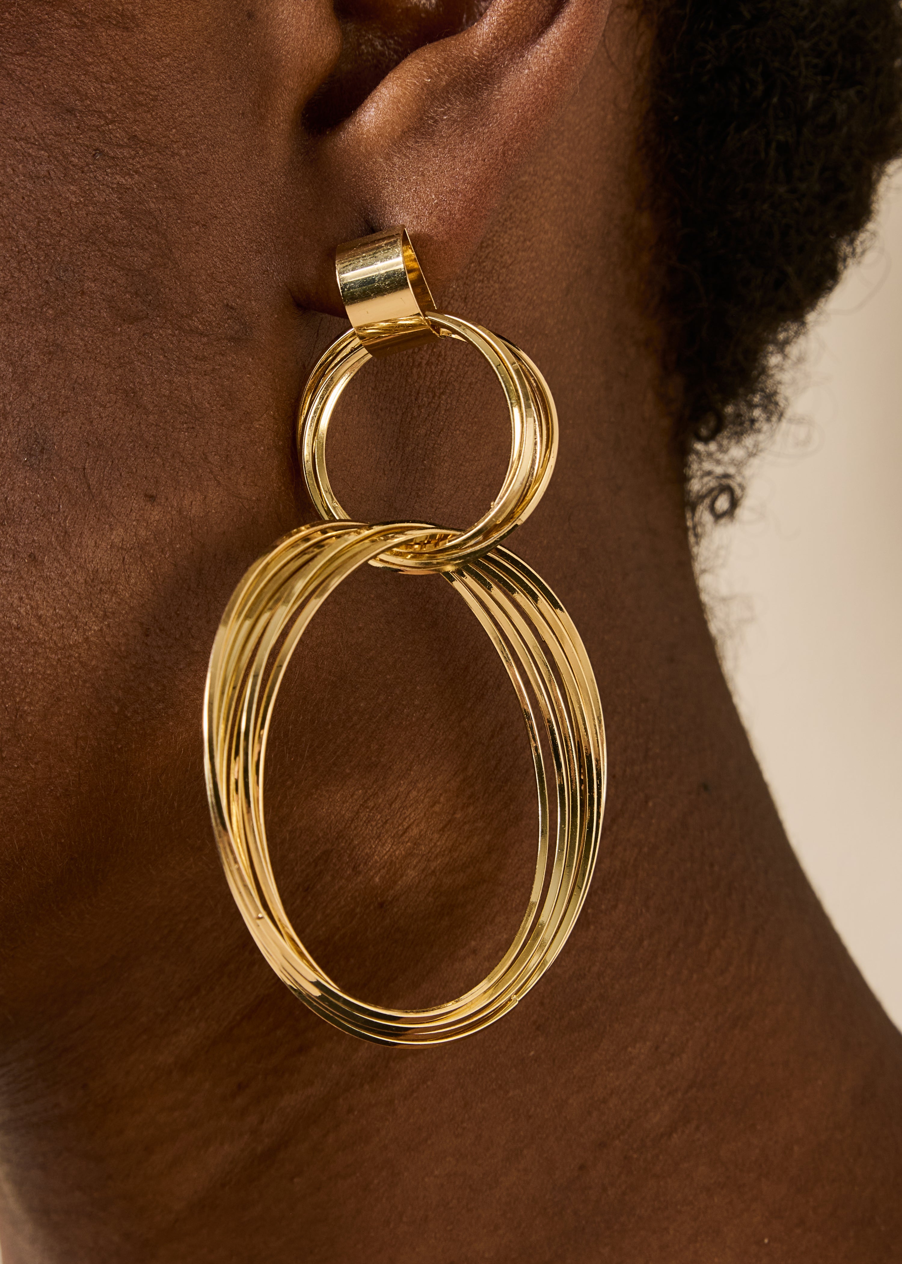 Boucles d'oreilles dorées multianneaux