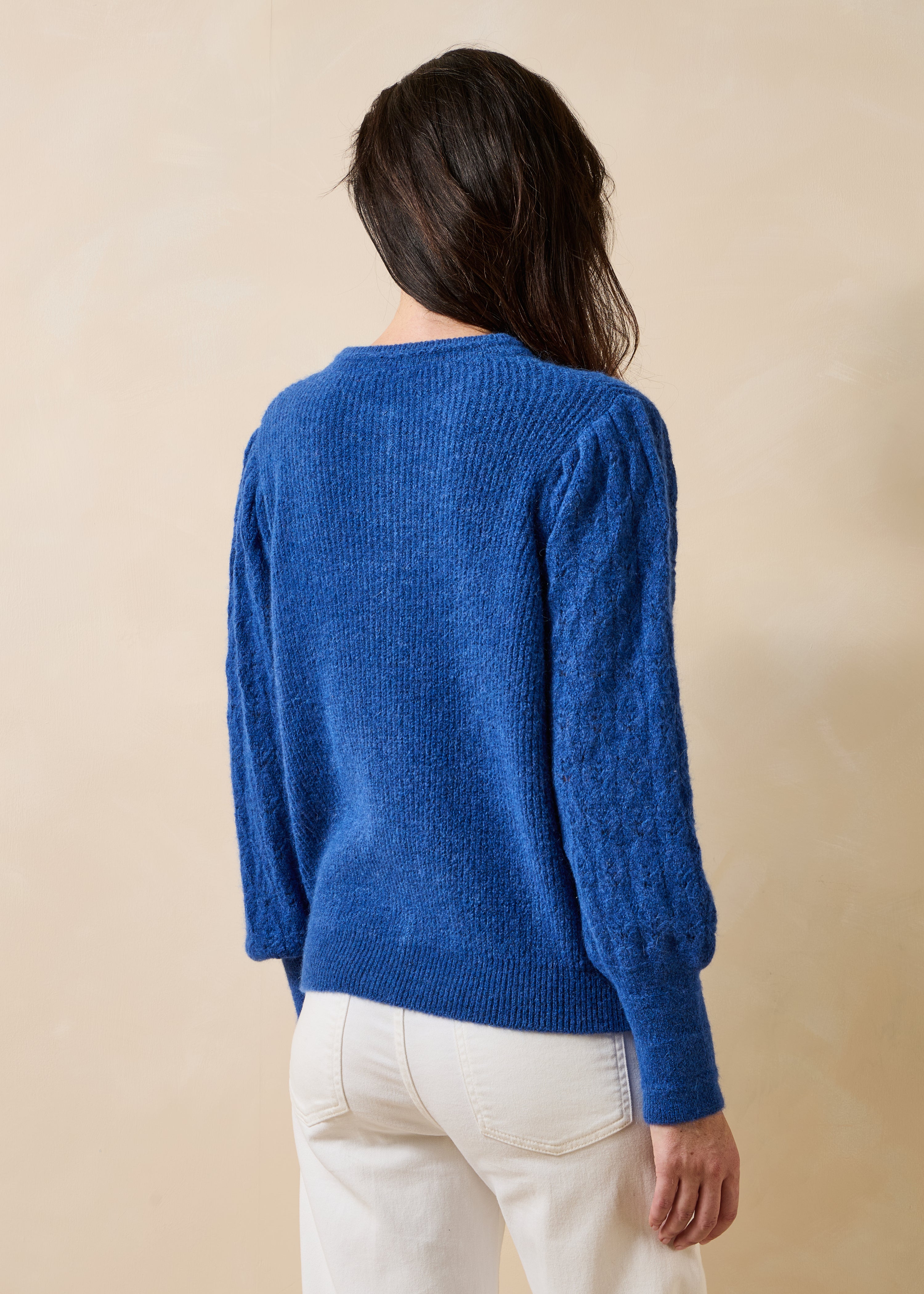 Navy blue long-sleeve cardigan with round neckline