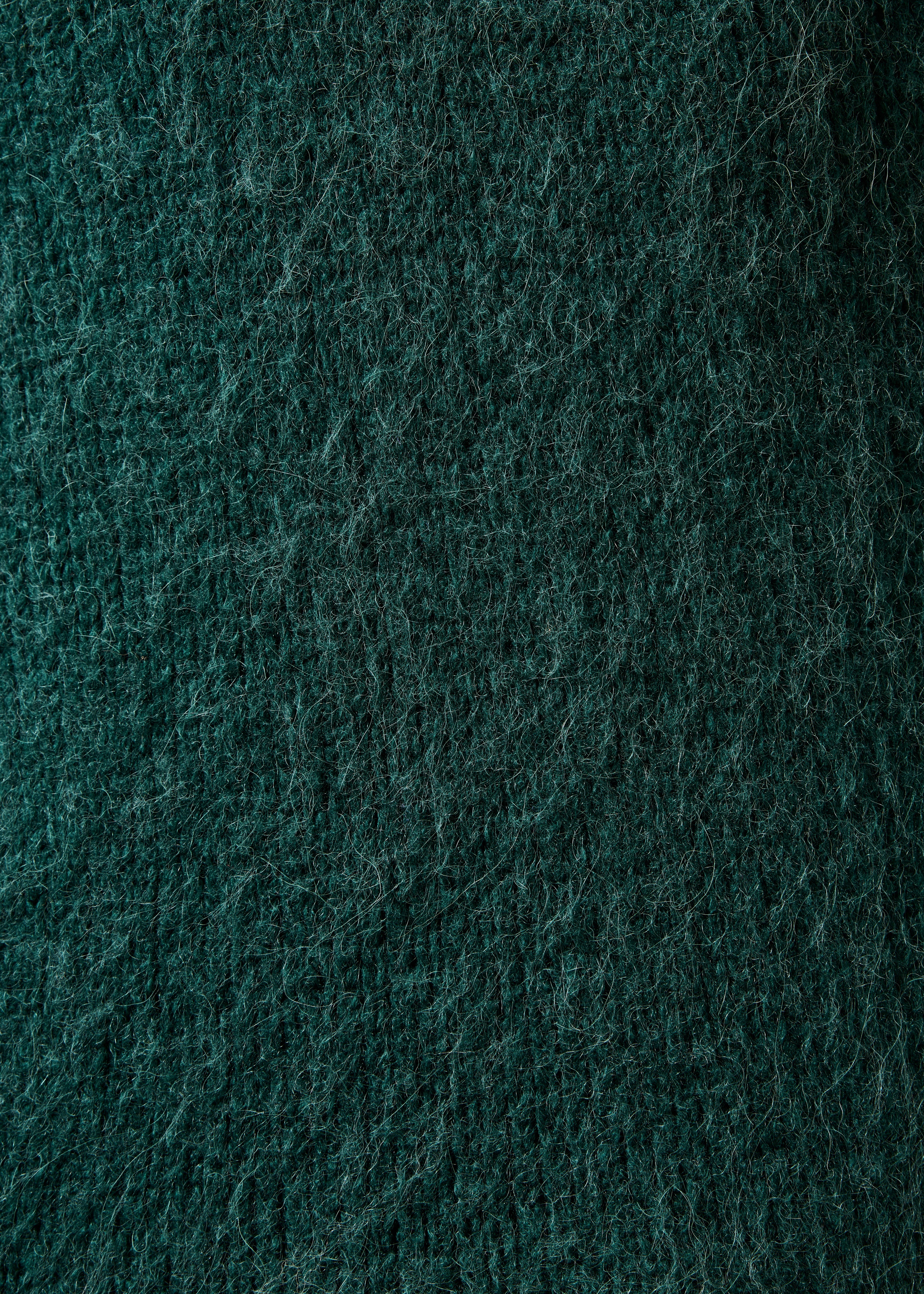 Groene gilet met lange mouwen en V-hals