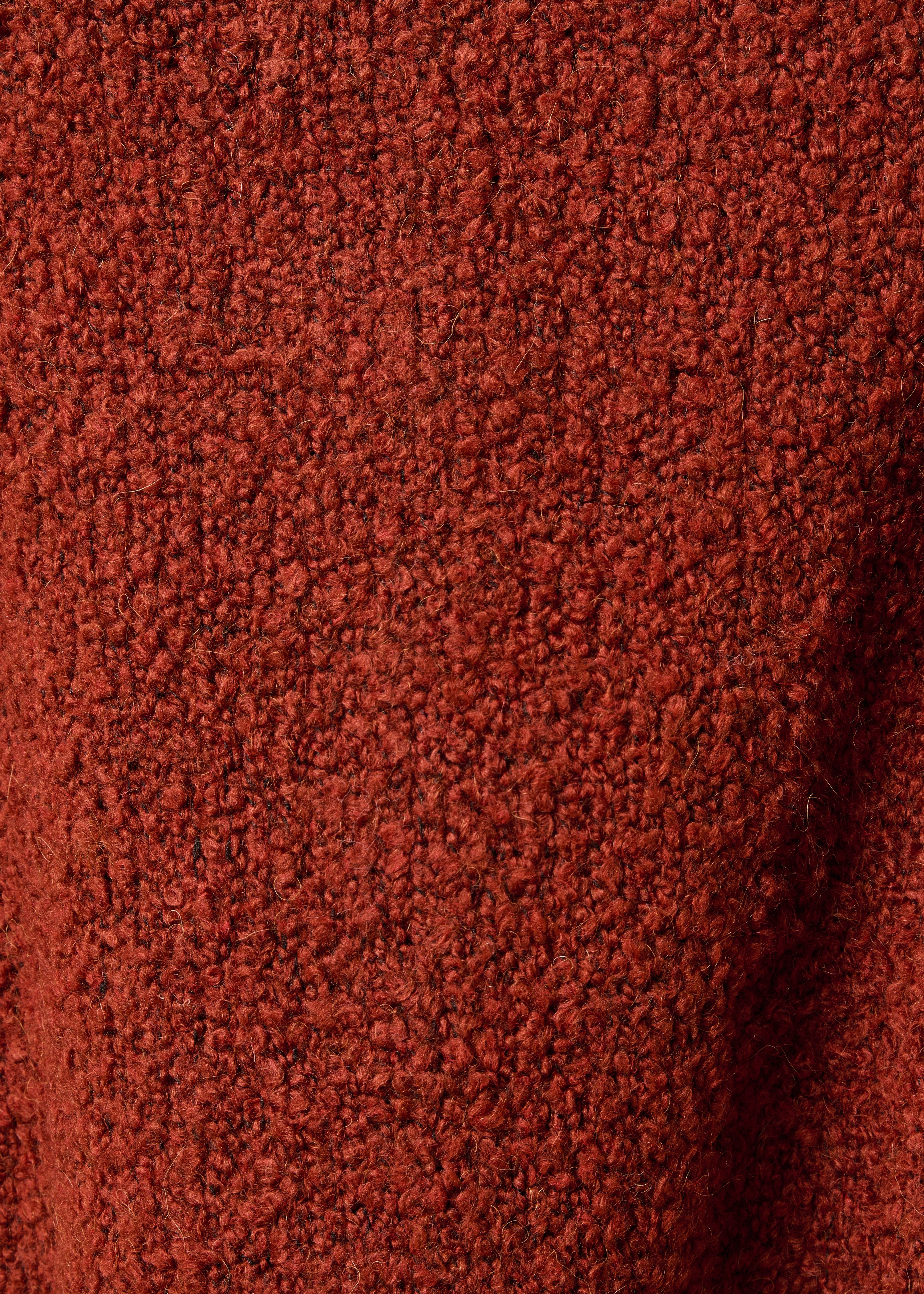 Rust-colored vest