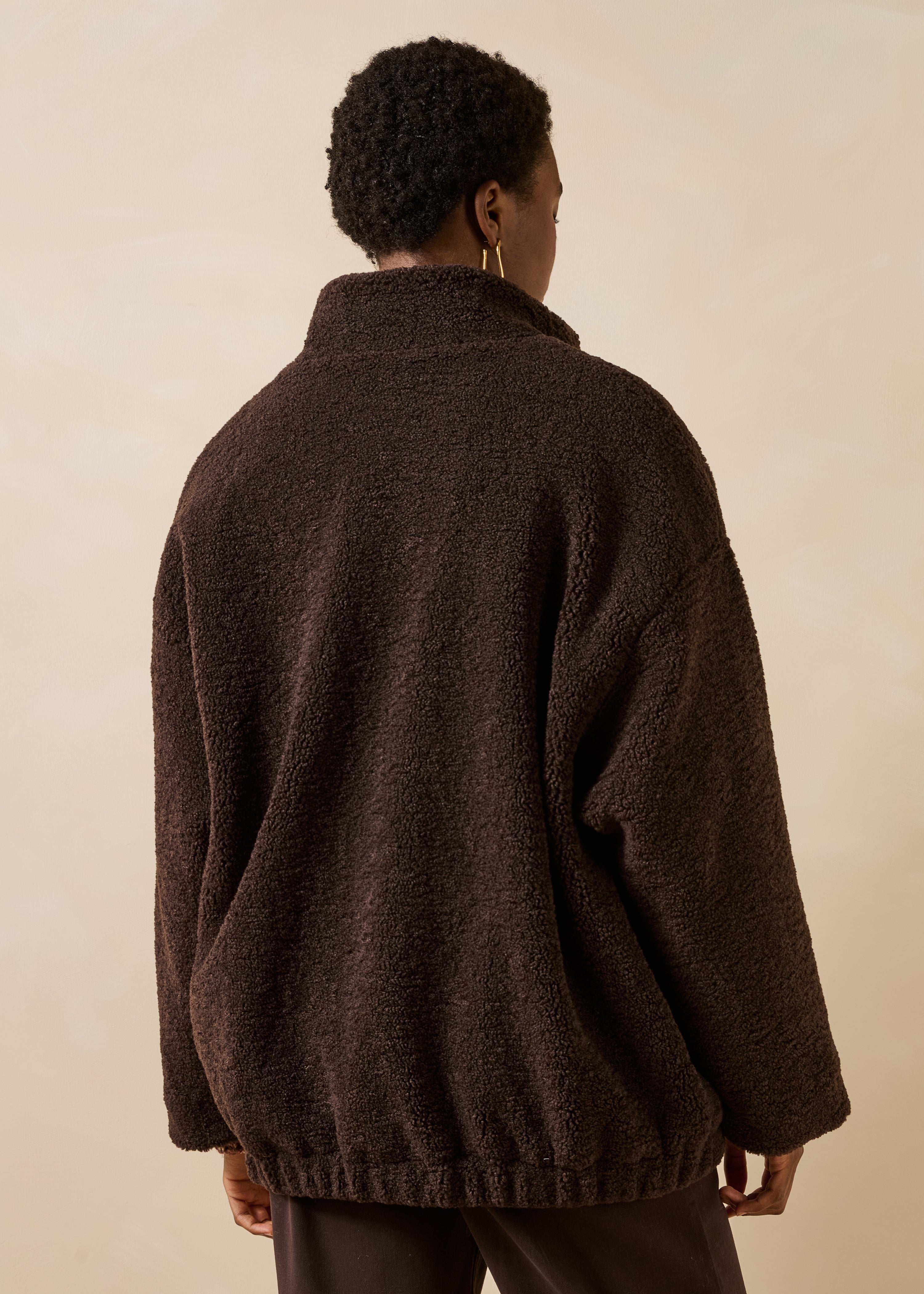 Oversized brown bomber jacket with long sleeves