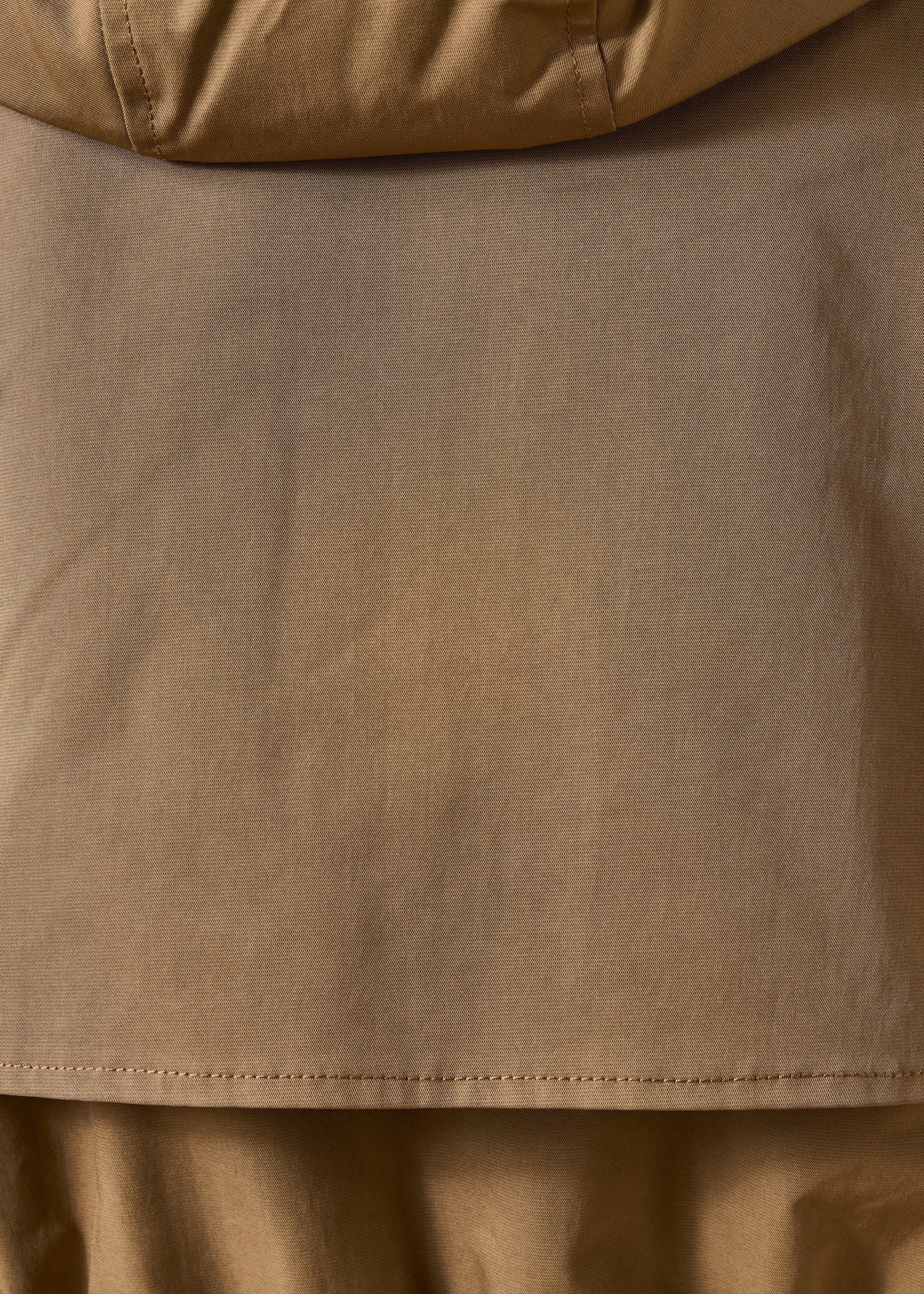 Lange beige parka met capuchon en nepbont