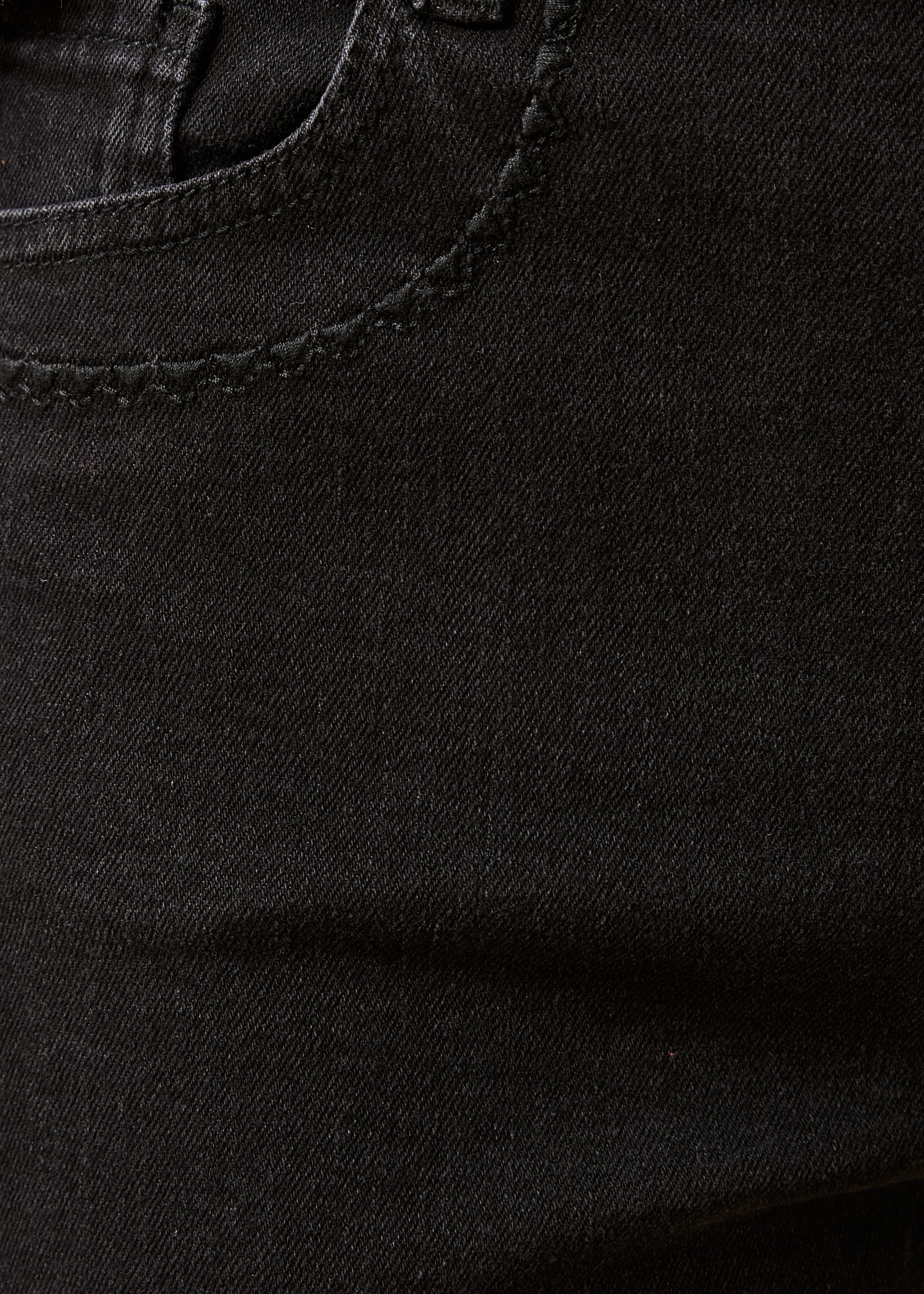 Jean slim noir délavé en coton biologique
