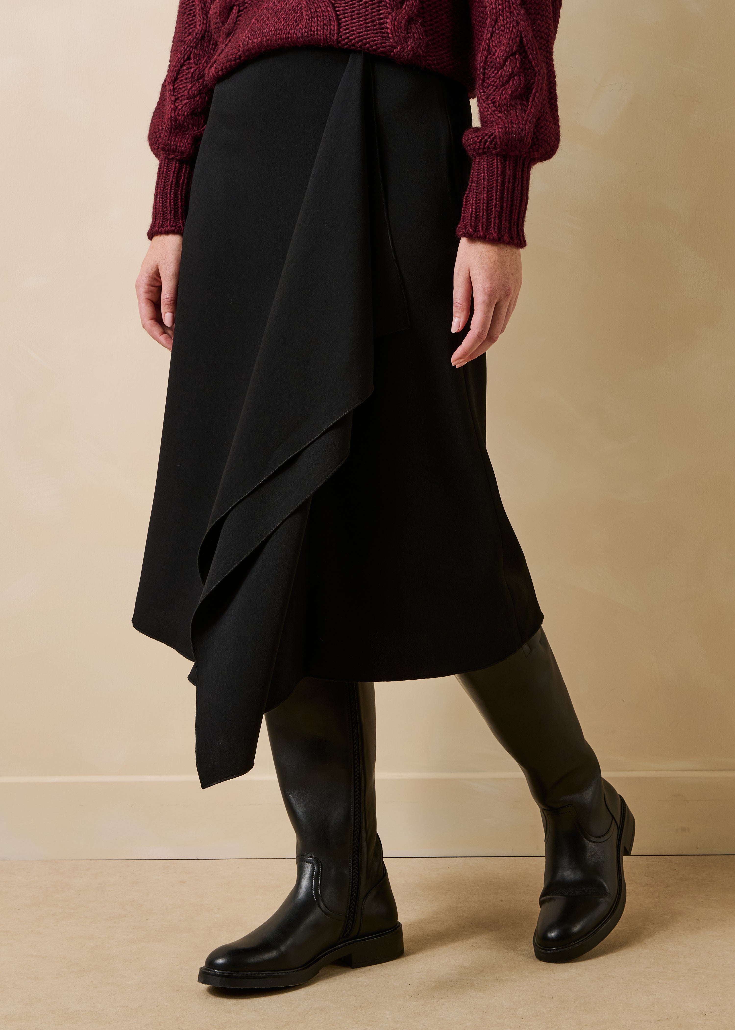 Black high-waisted asymmetrical fluid midi skirt