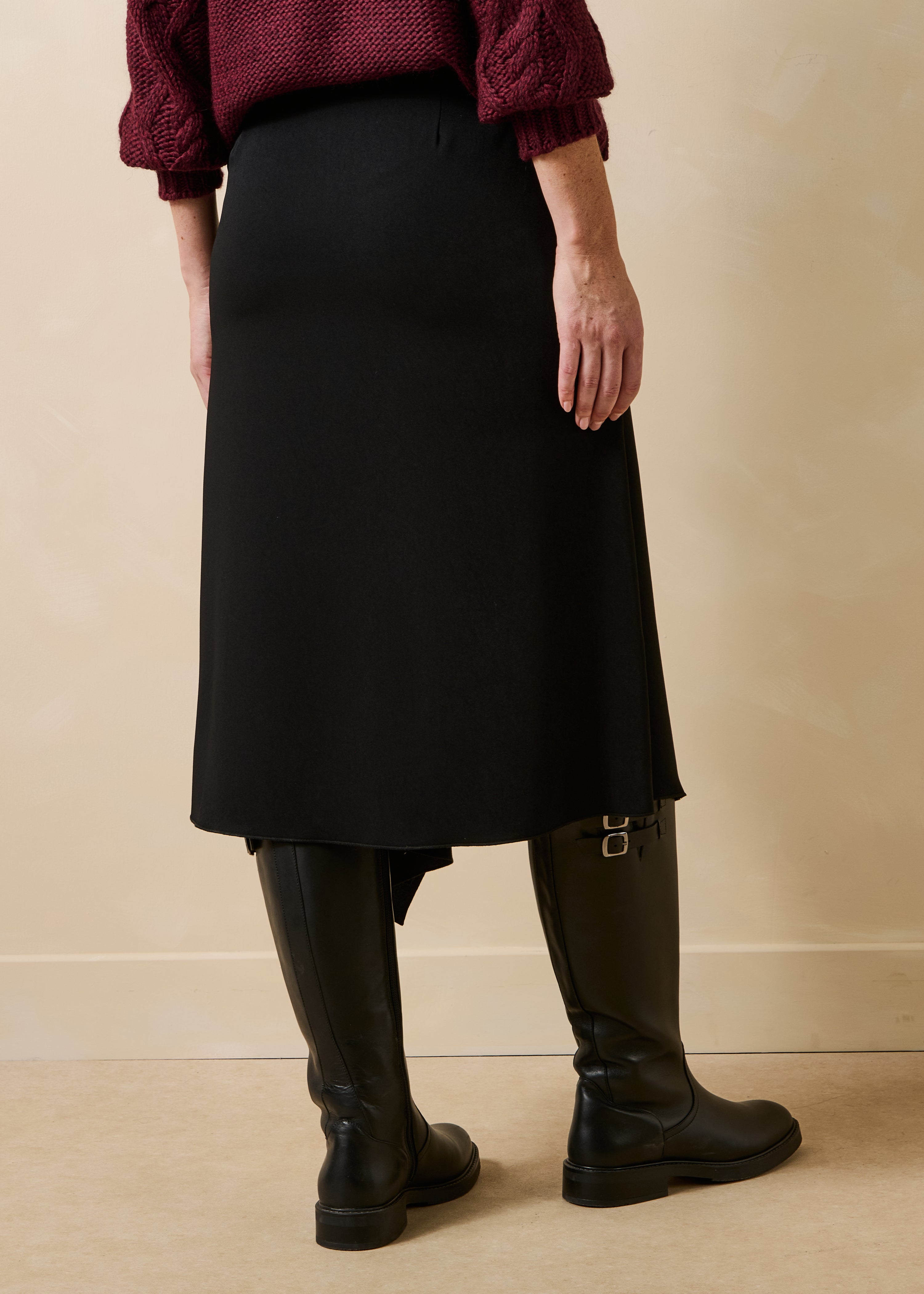 Black high-waisted asymmetrical fluid midi skirt