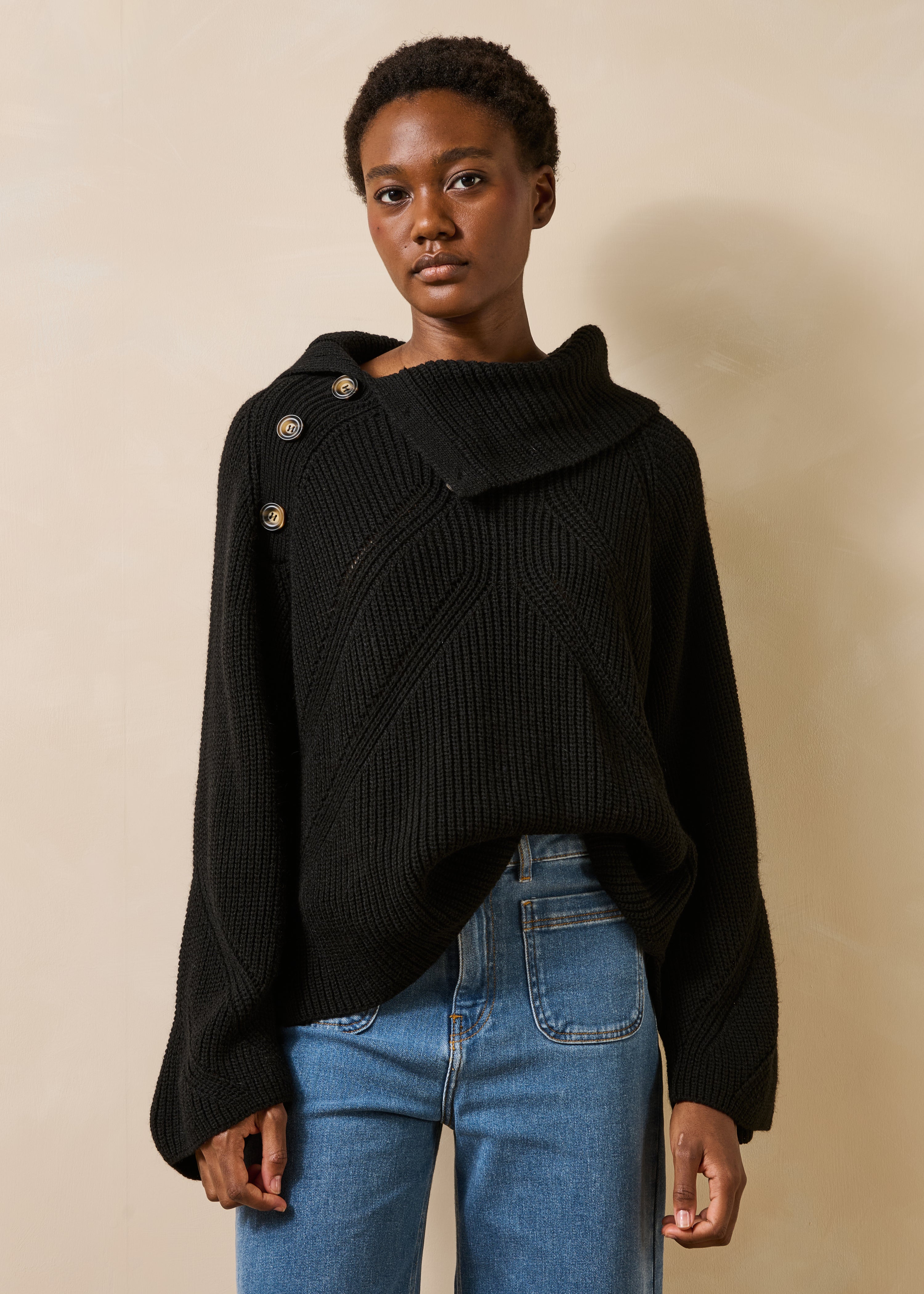 Black long-sleeve asymmetrical collar sweater