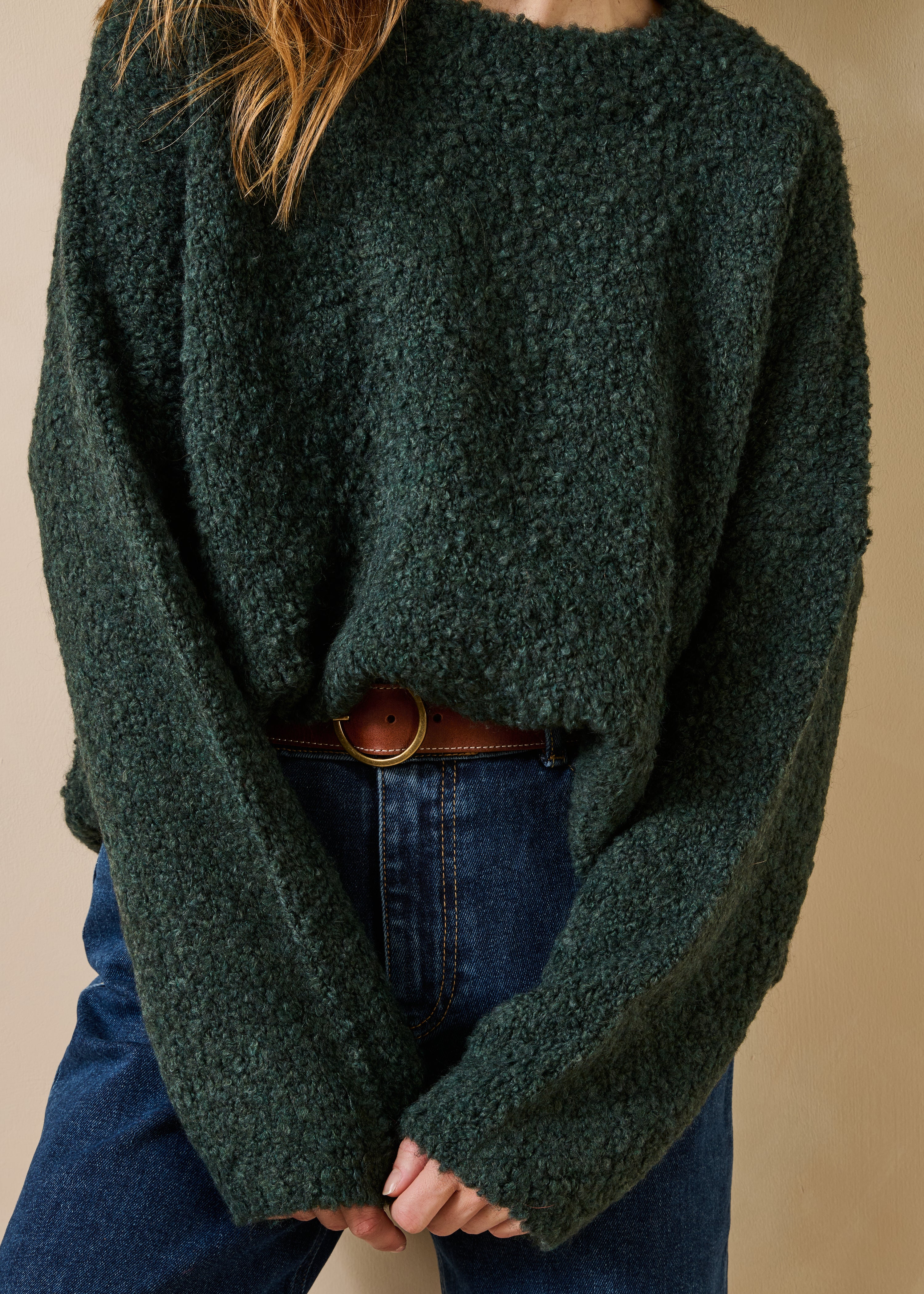 Pull groen flesje boucle met lange mouwen en ronde hals