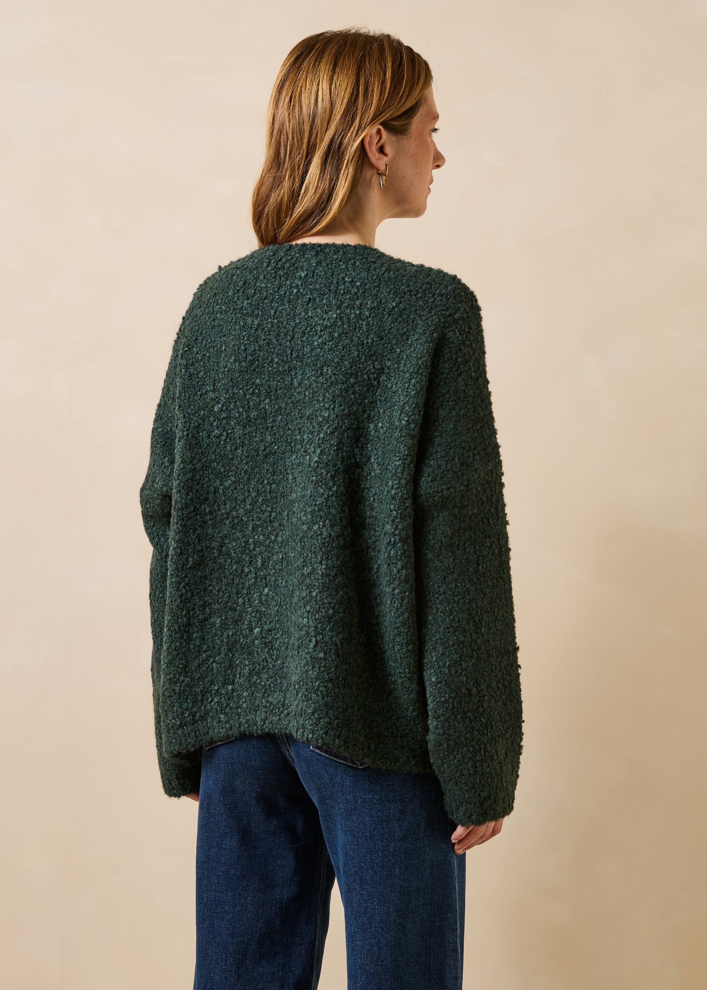Pull groen flesje boucle met lange mouwen en ronde hals