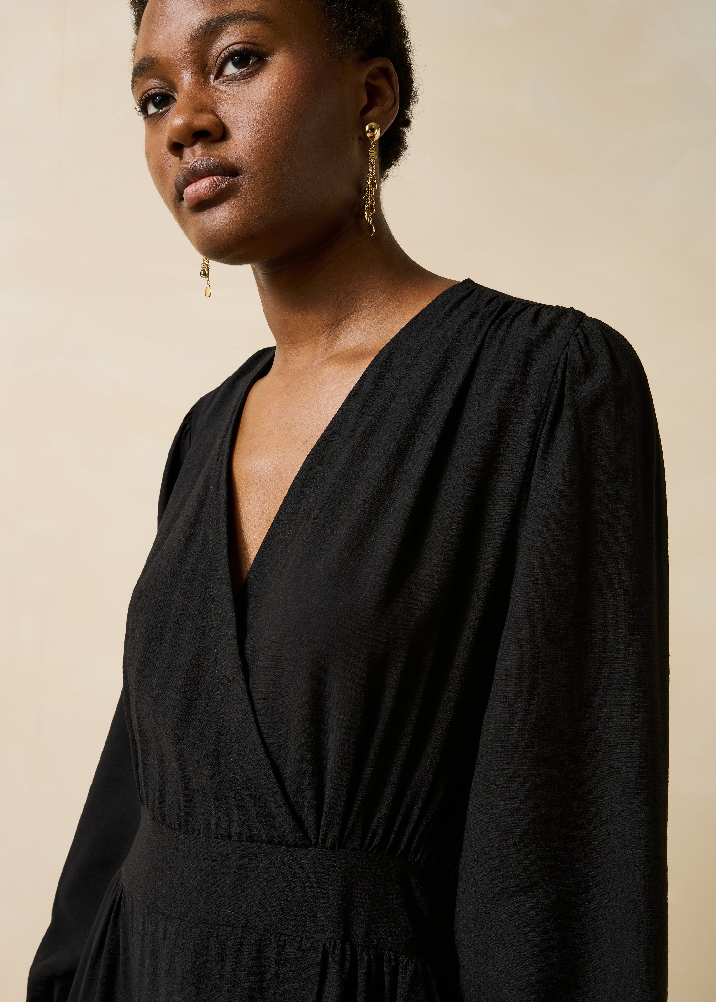 Black fitted long wrap dress